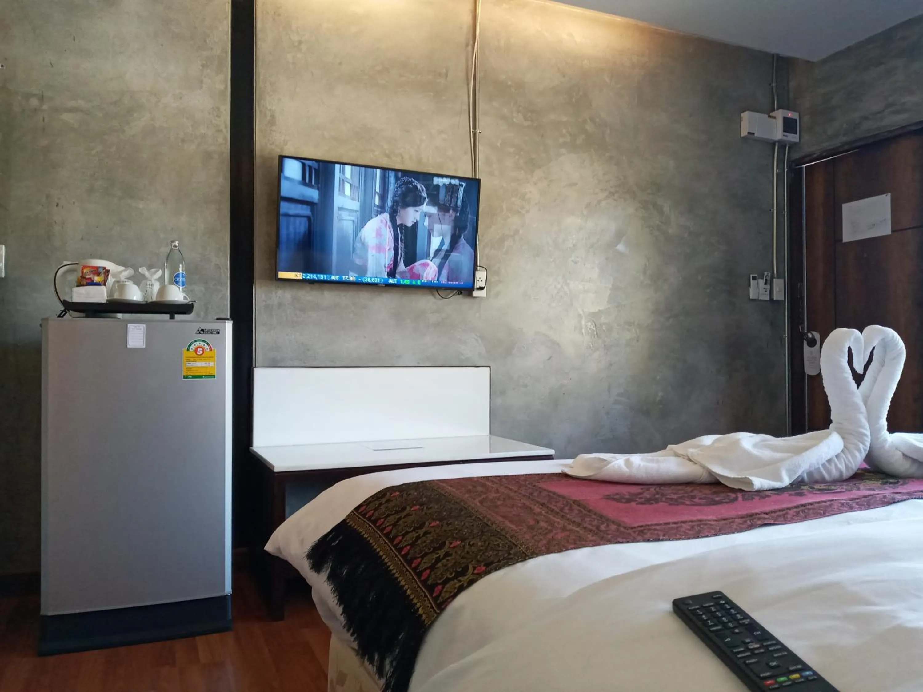 Bed in Naga Tara Boutique Resort