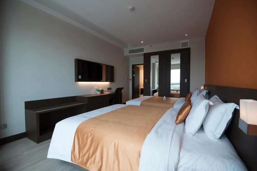 Bed in Astana Wing - Riverside Majestic Hotel