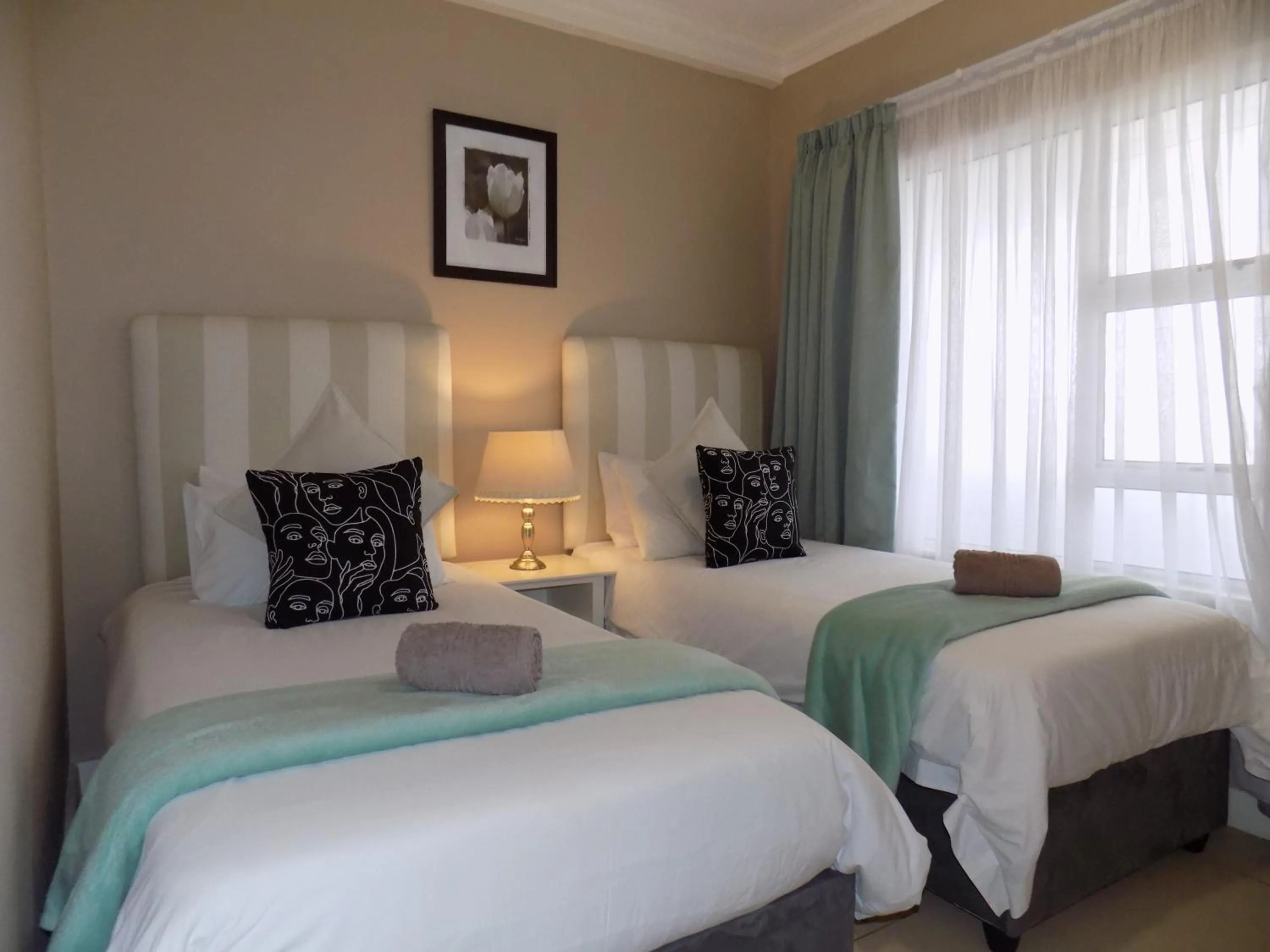 Bed in 2-bedroom Sea View Apartments
