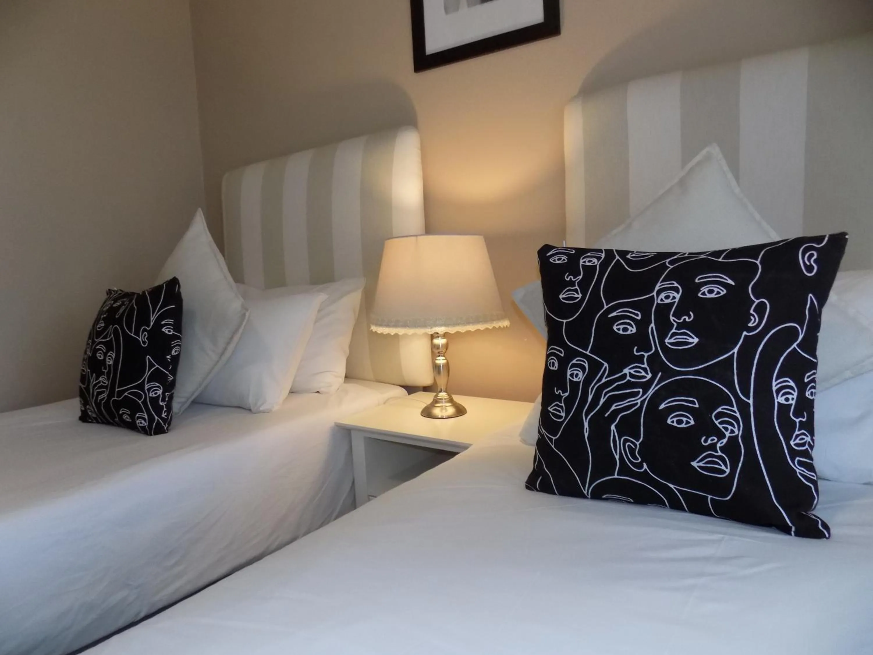Bed in 2-bedroom Sea View Apartments