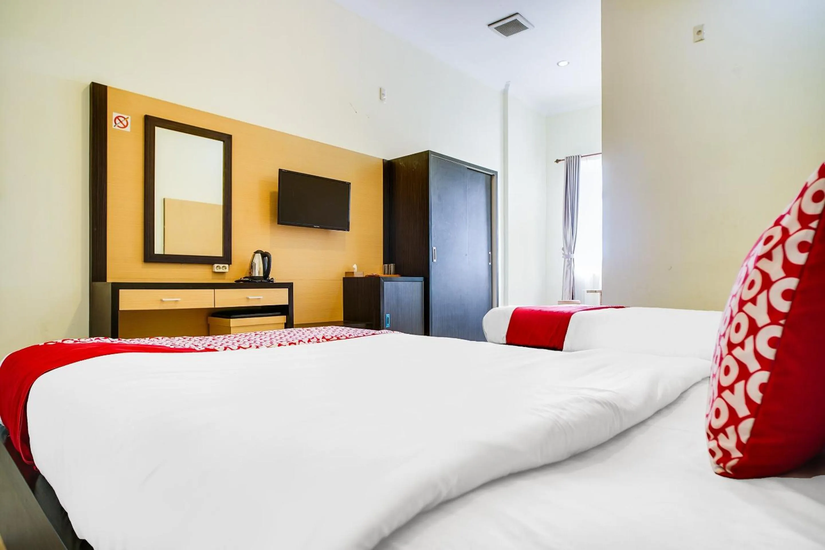 Bedroom in Capital O 540 Esther Hotel