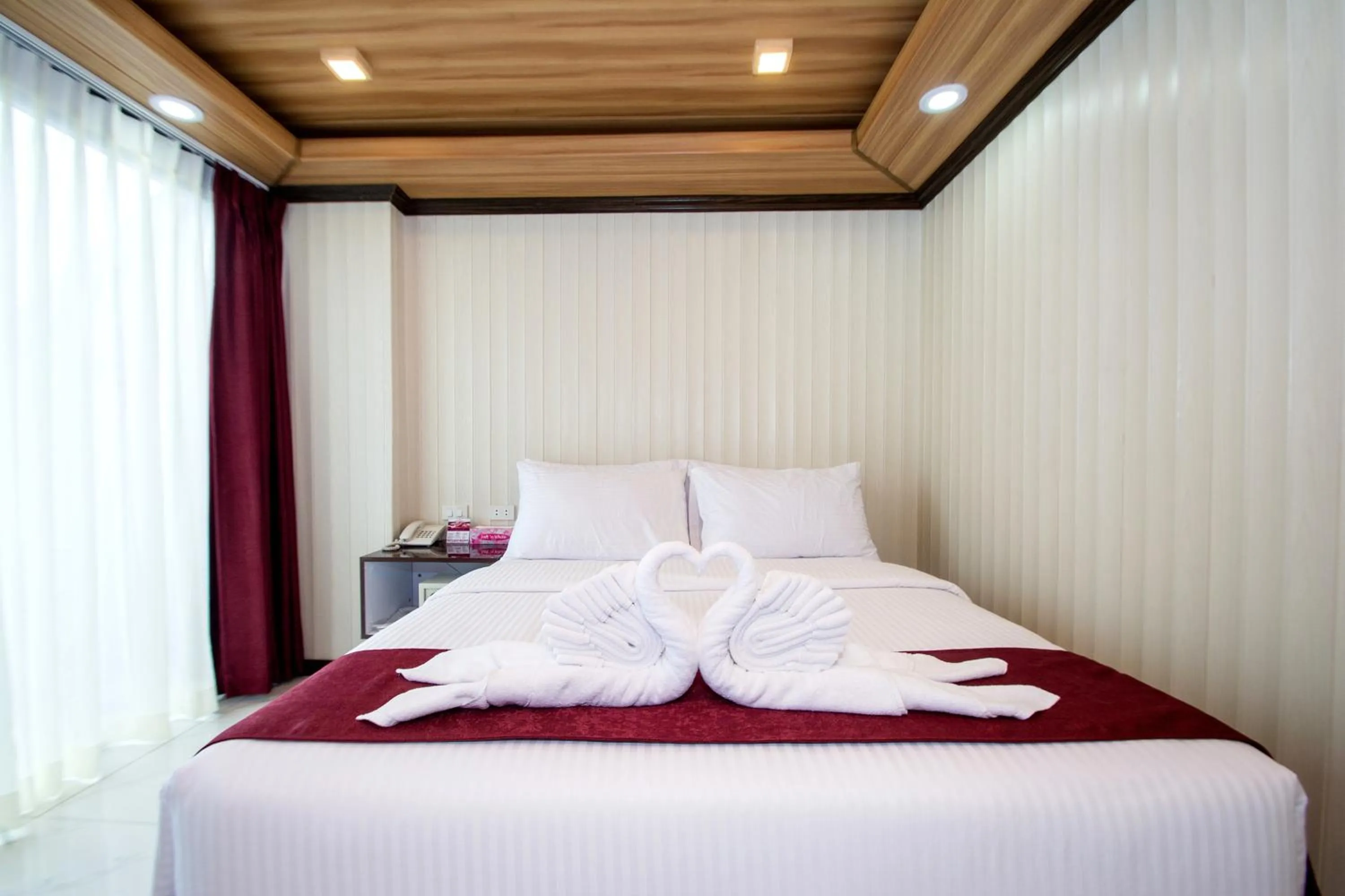 Bed in Diamond Water Edge Resort