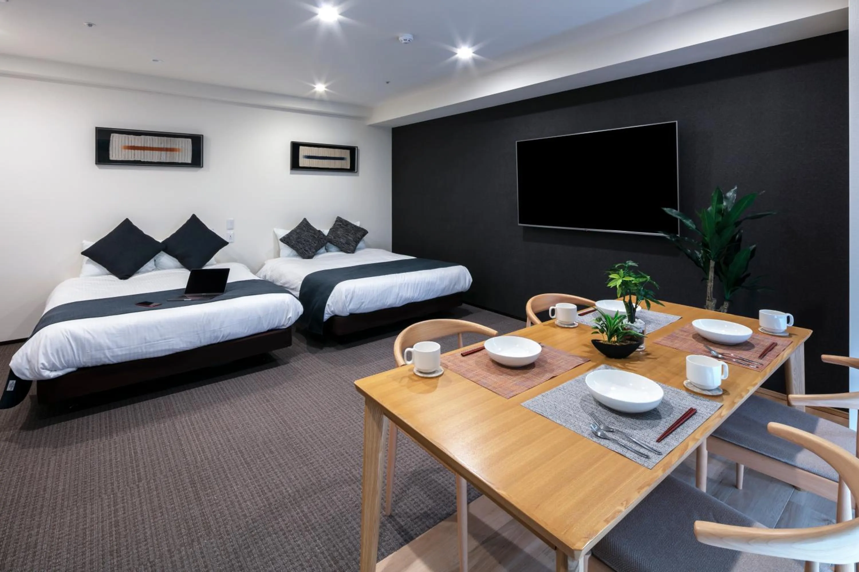 Living room, Bed in Randor Hotel Sapporo Suites