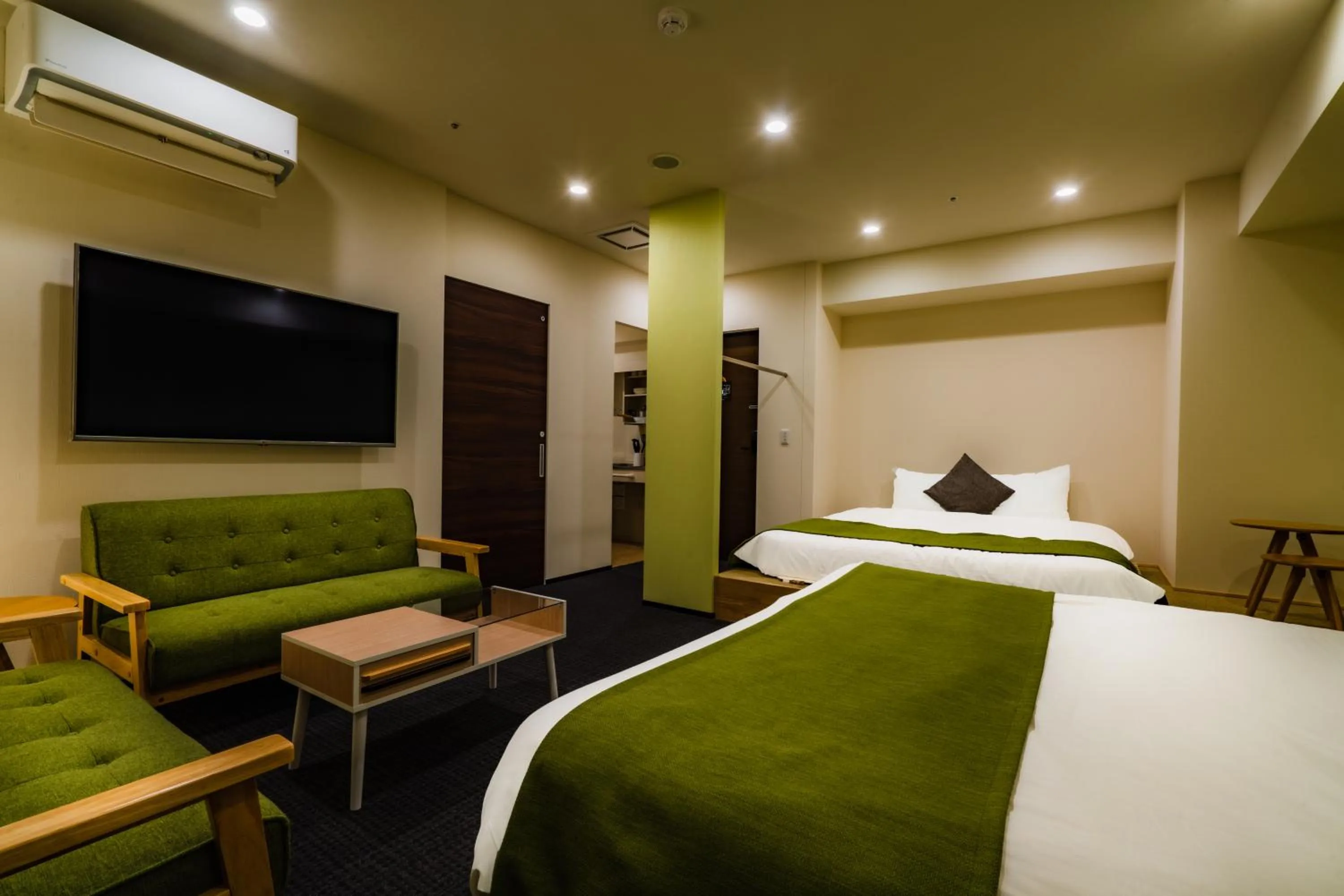 Photo of the whole room, Bed in Randor Hotel Sapporo Suites