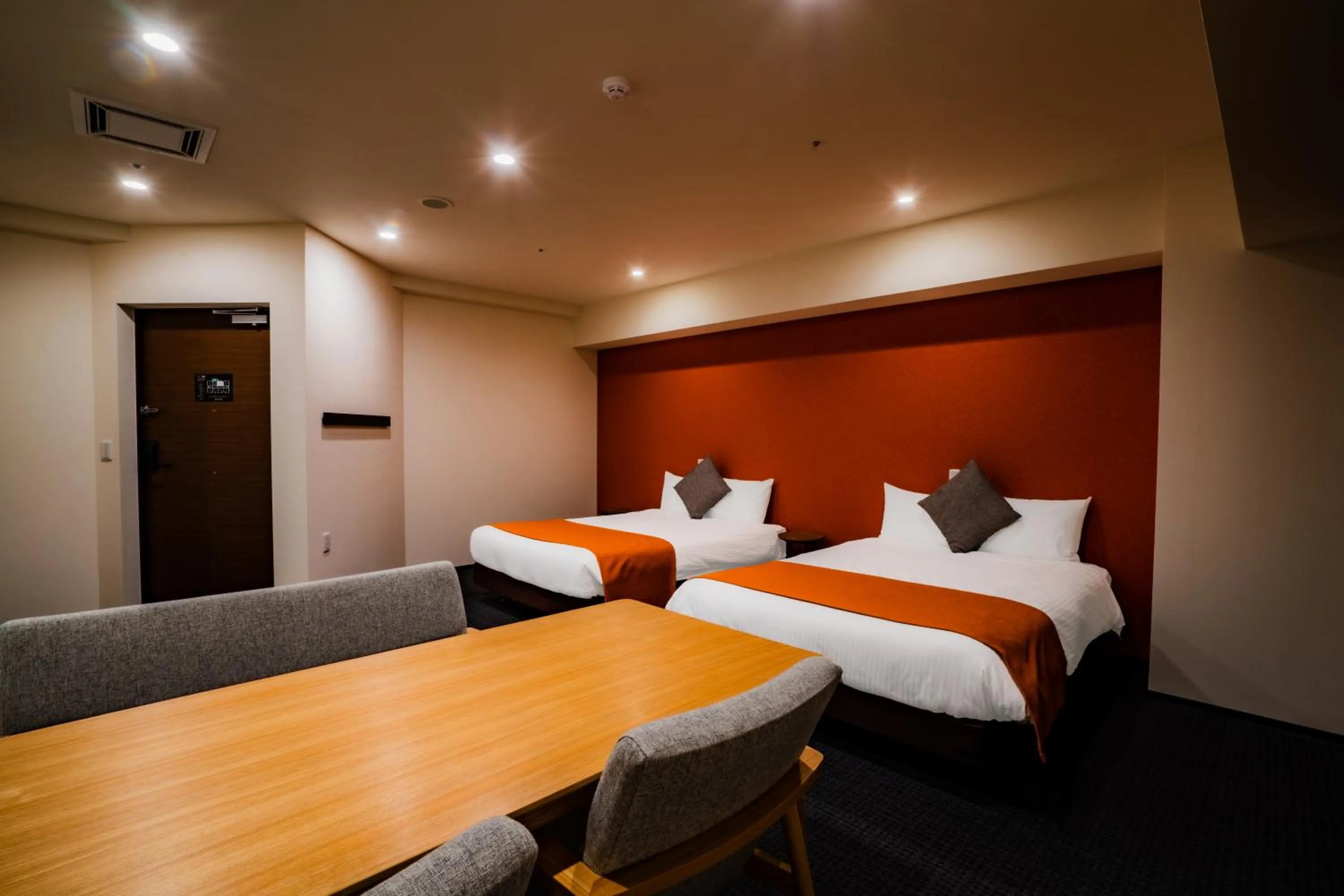 Photo of the whole room, Bed in Randor Hotel Sapporo Suites