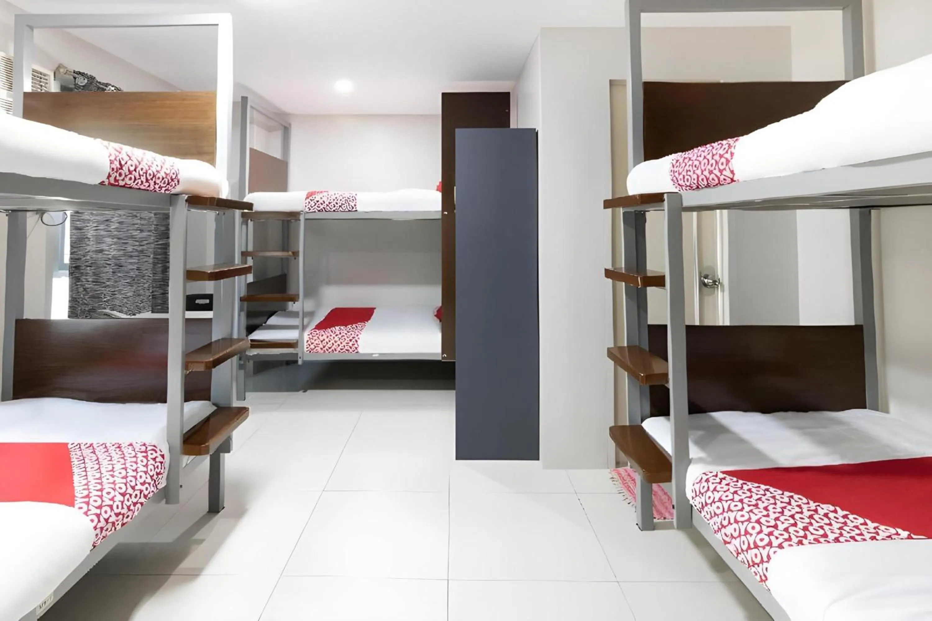 Bedroom, Bed in OYO 152 Sangco Condotel