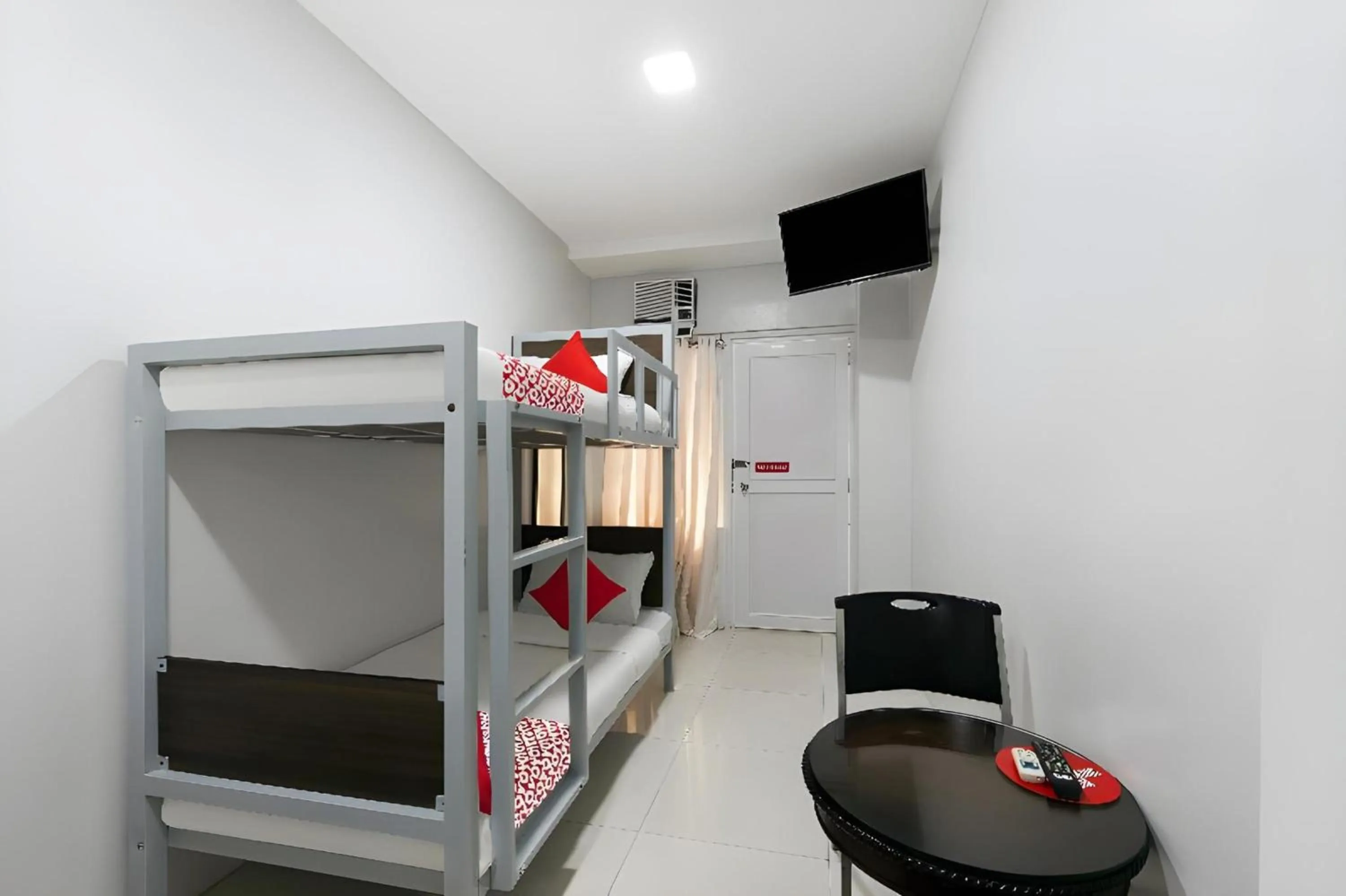 Bed in OYO 152 Sangco Condotel