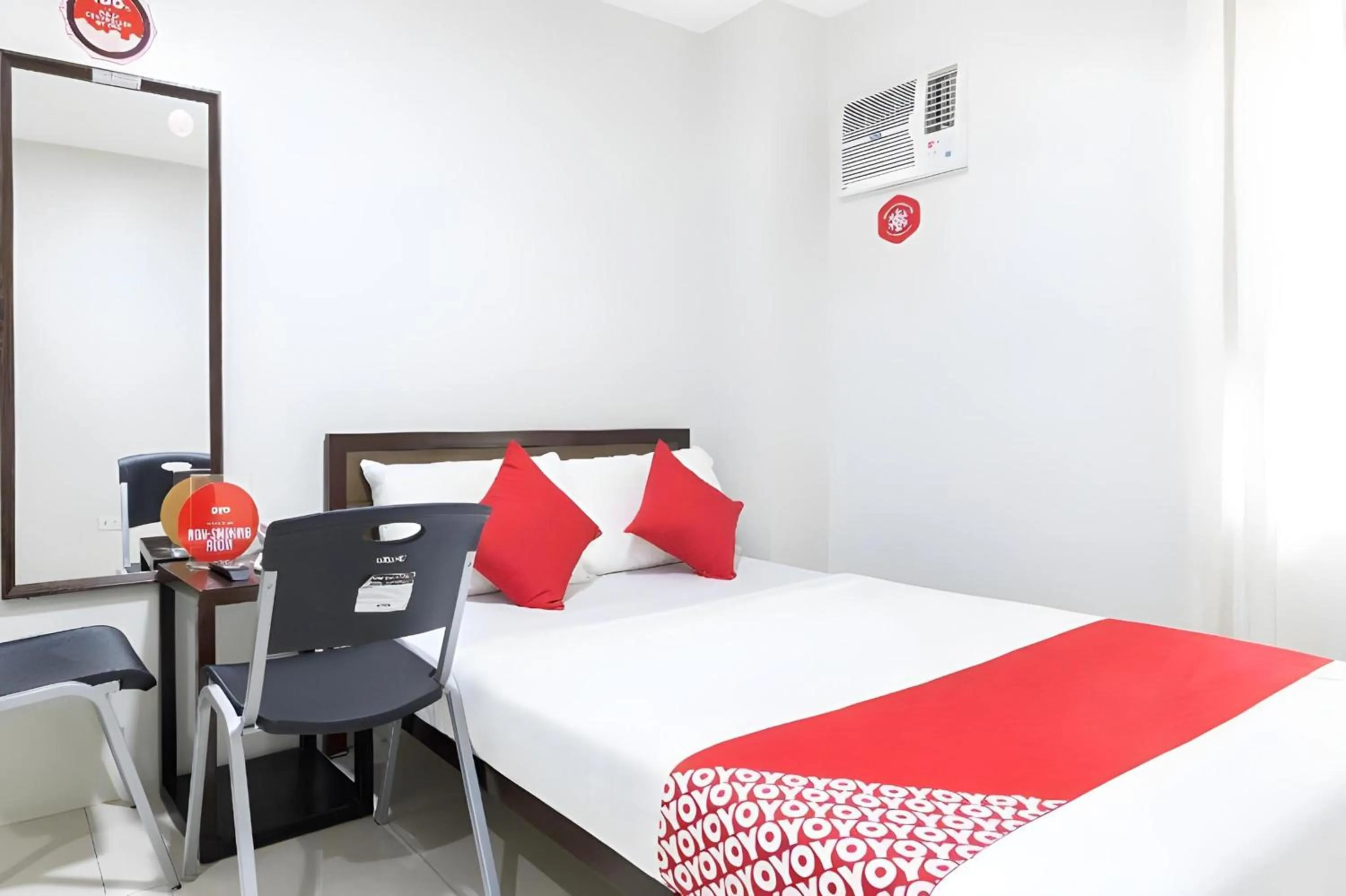 Bedroom, Bed in OYO 152 Sangco Condotel