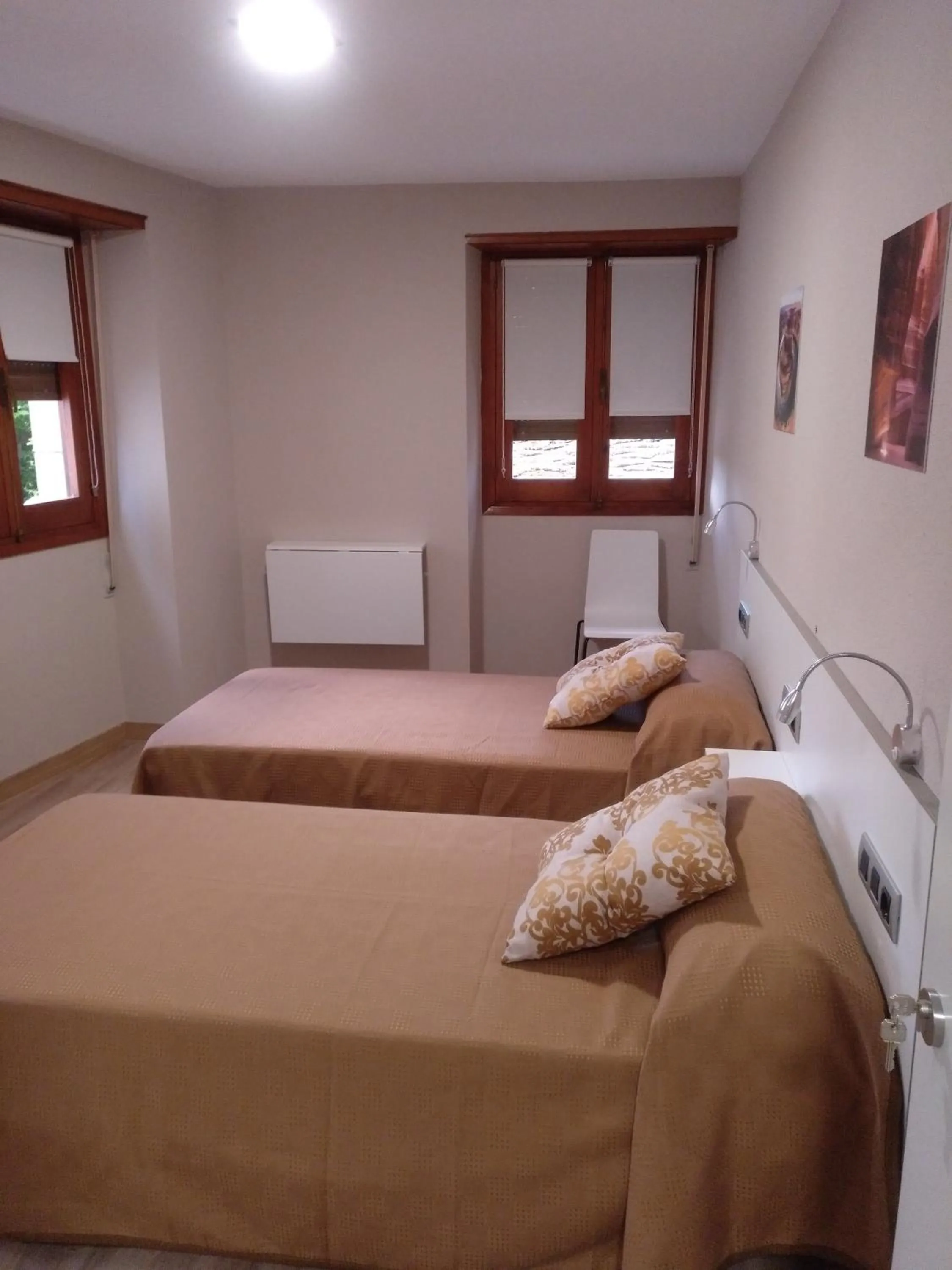 Bed in Travesia Rooms