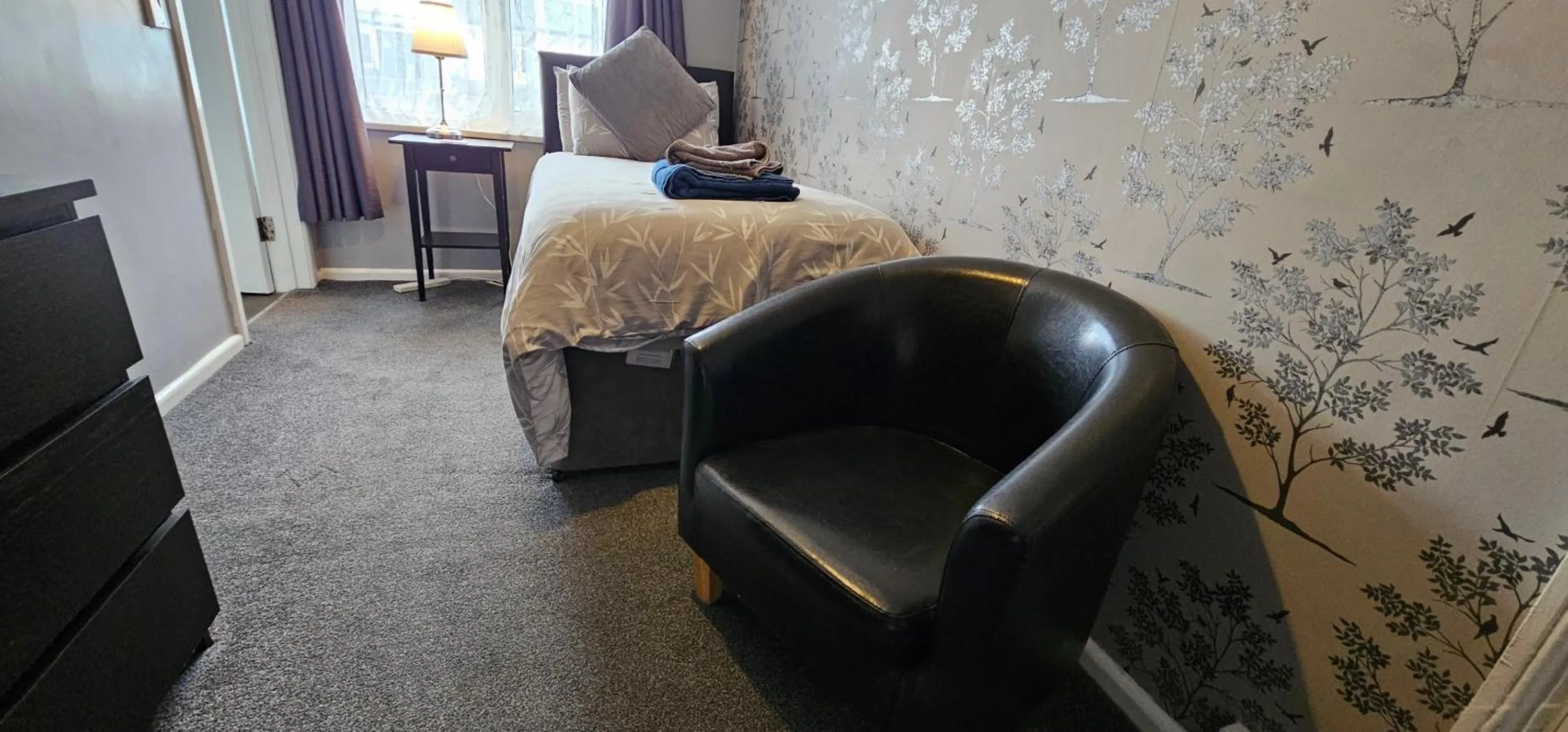 Bed in The Roslyn Guest House