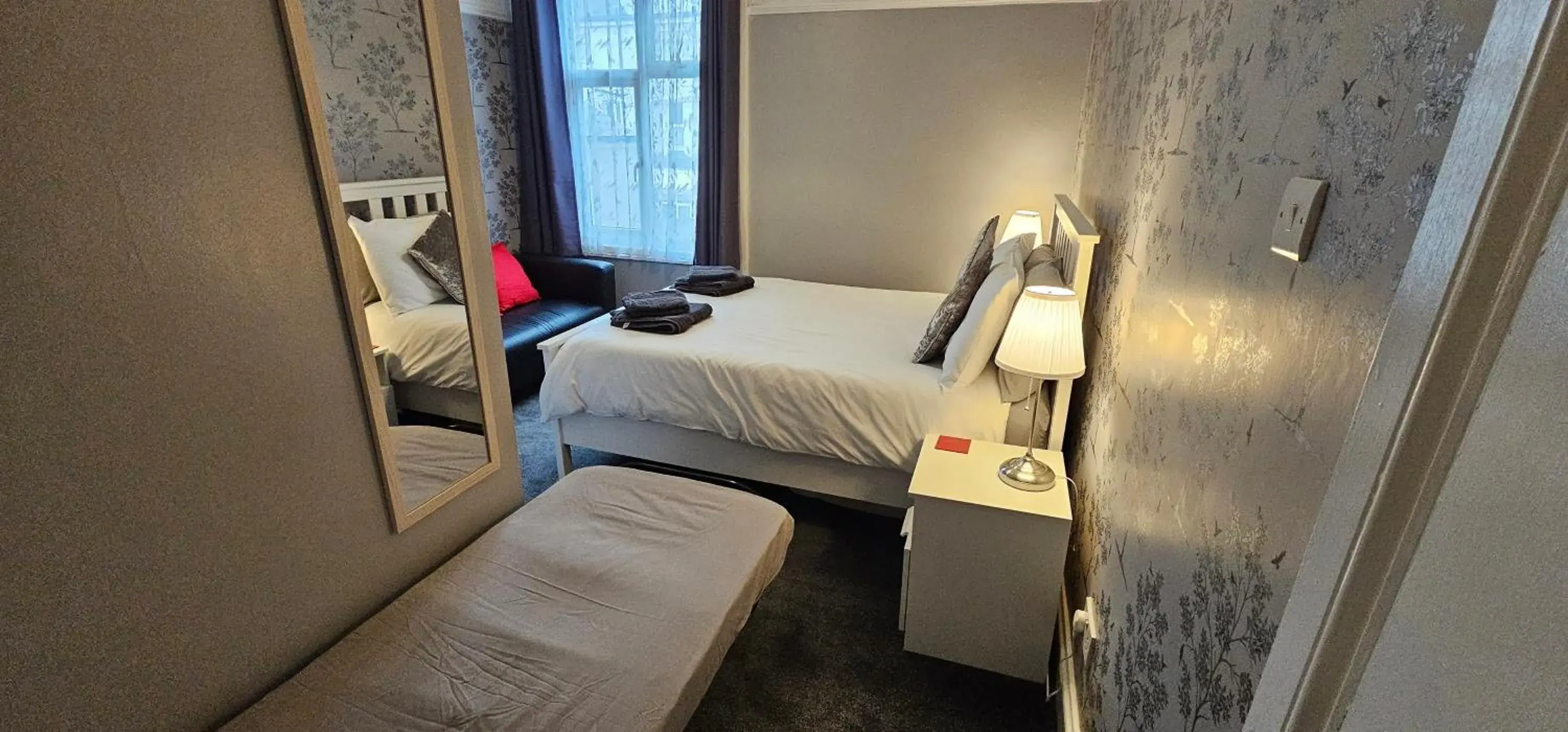 Bed in The Roslyn Guest House Bed in The Roslyn Guest House