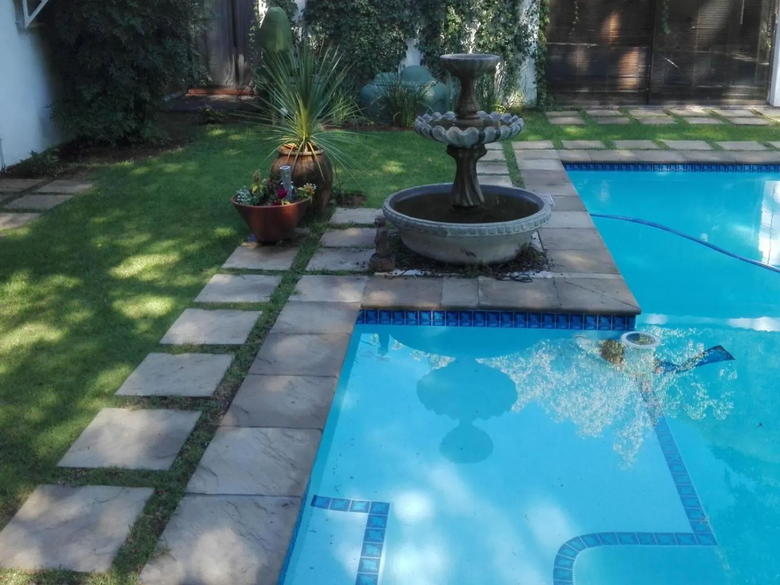 Swimming pool in Azrielle Guesthouse