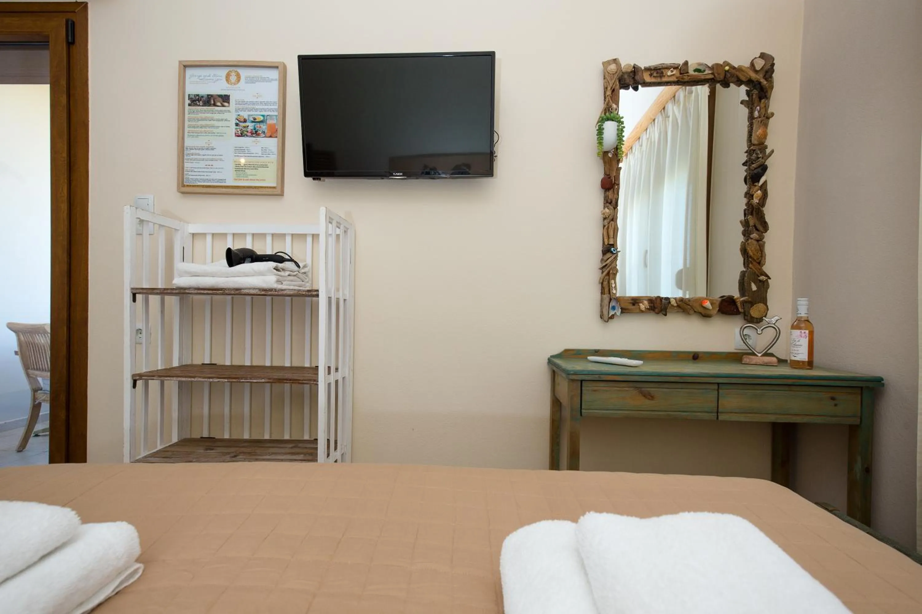 Bed in Arodamos Studios & Apts