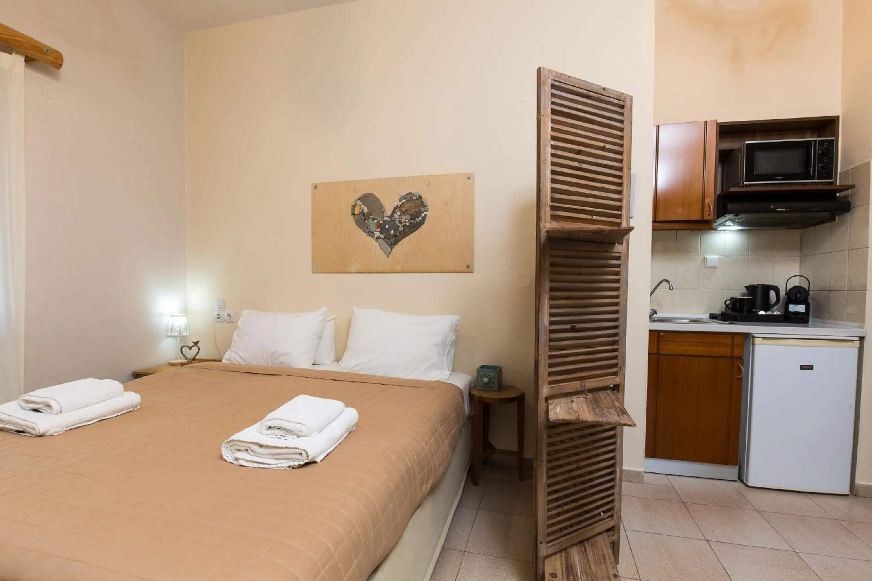 Kitchen or kitchenette, Bed in Arodamos Studios & Apts