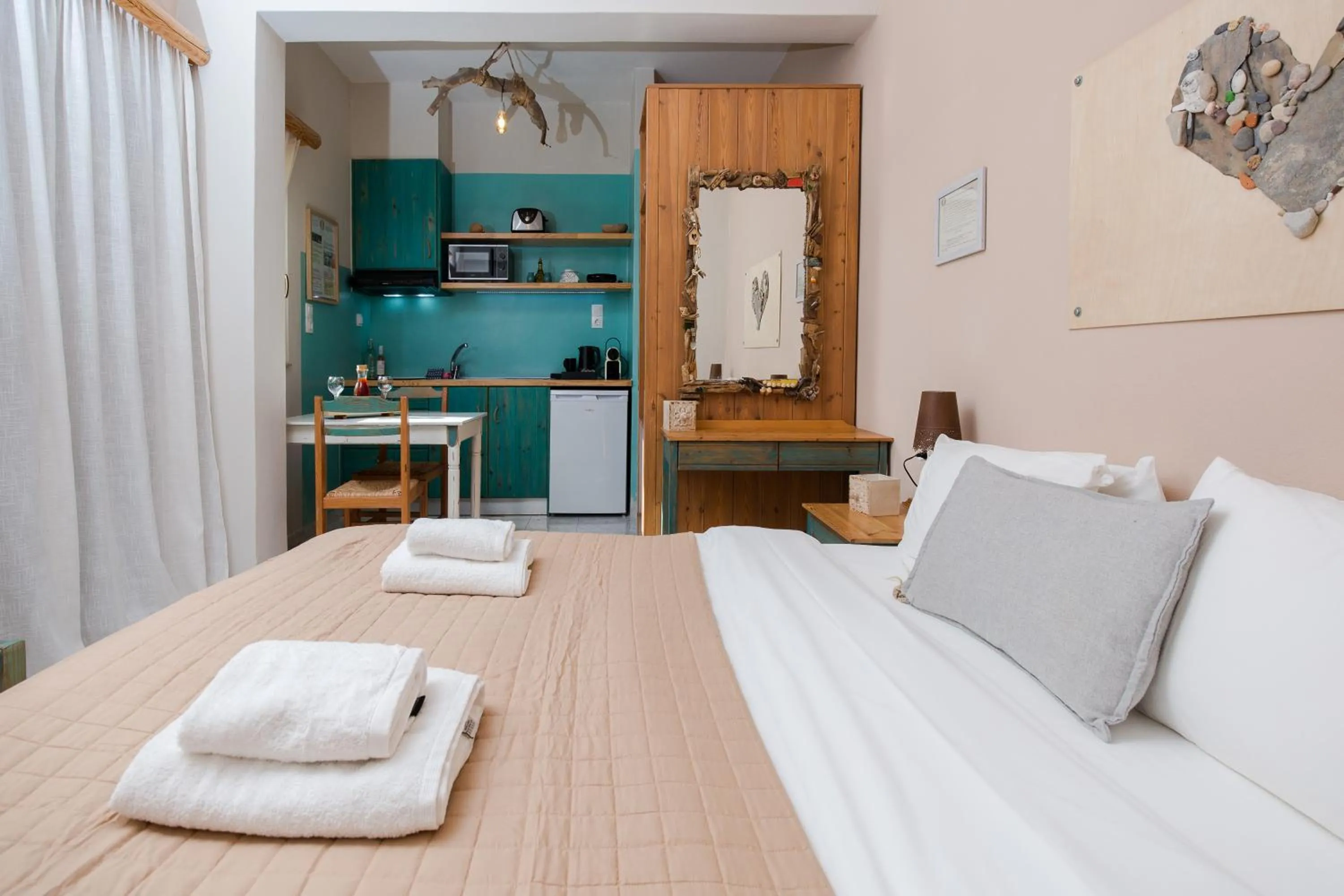 Kitchen or kitchenette, Bed in Arodamos Studios & Apts