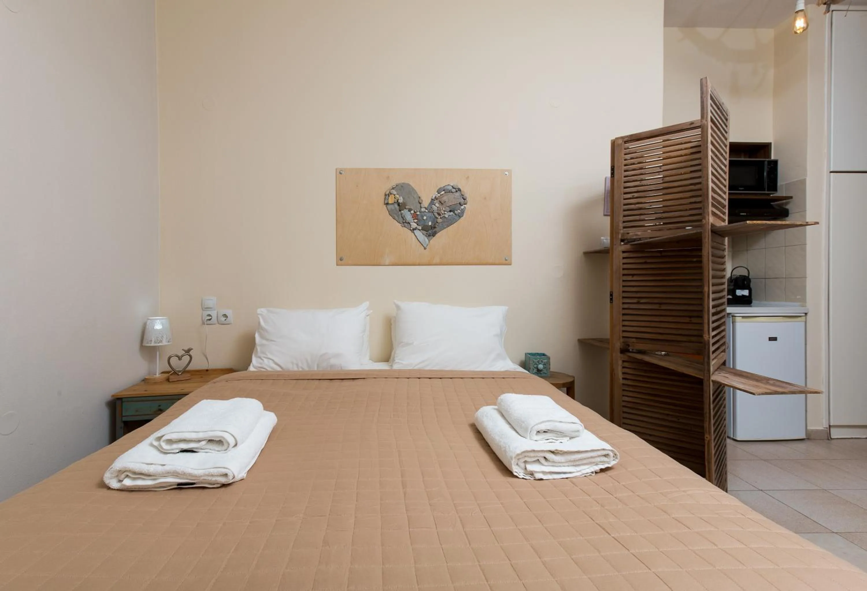 Bed in Arodamos Studios & Apts