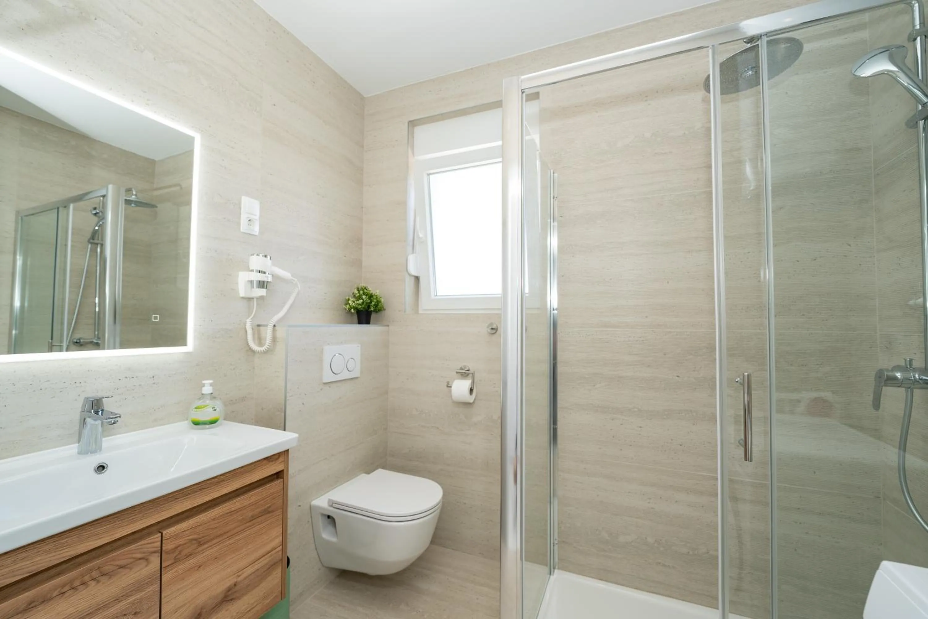 Shower in Poolside Hideout Apartments