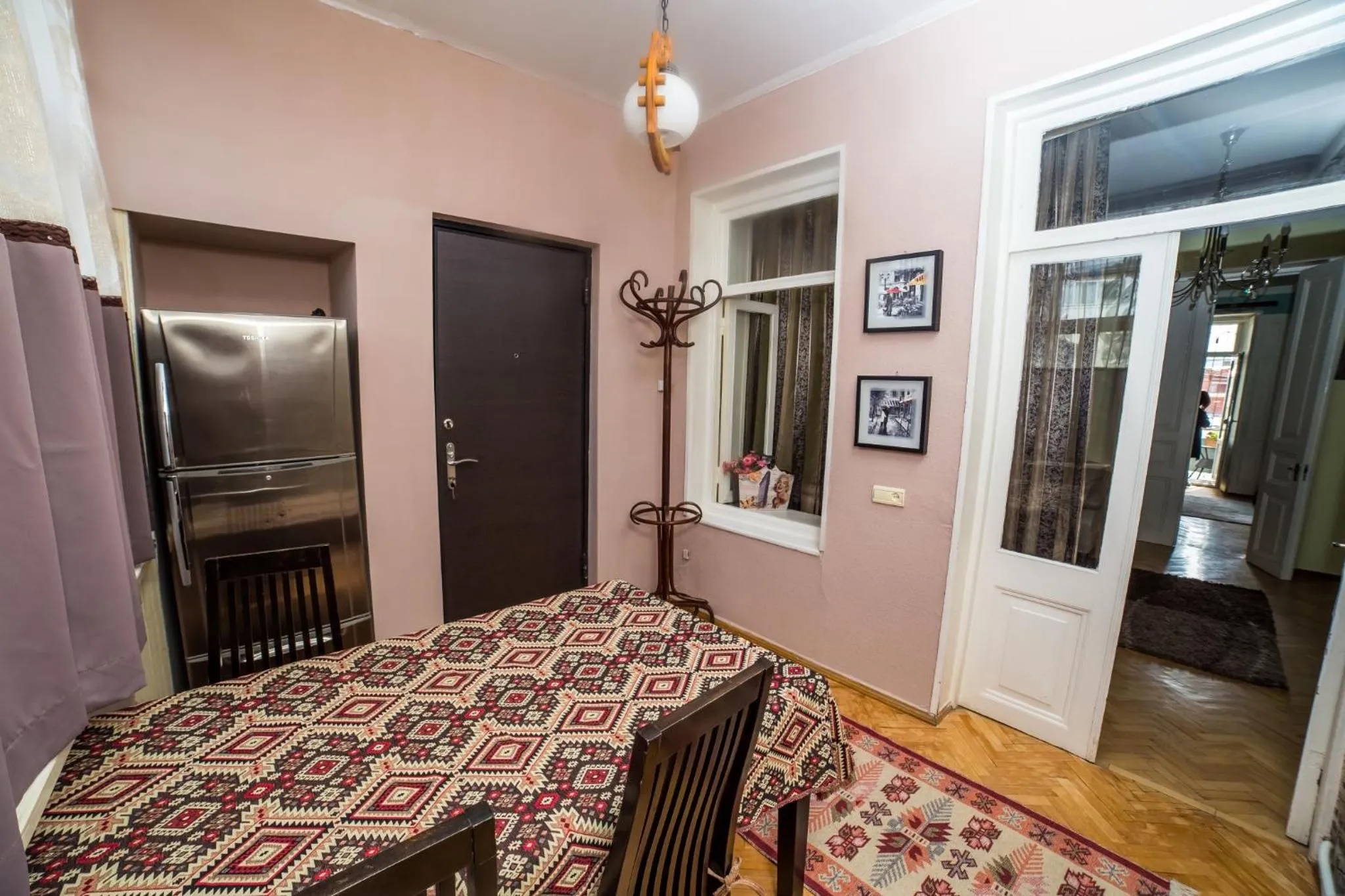 Seating area, Bed in Gold District Apartment