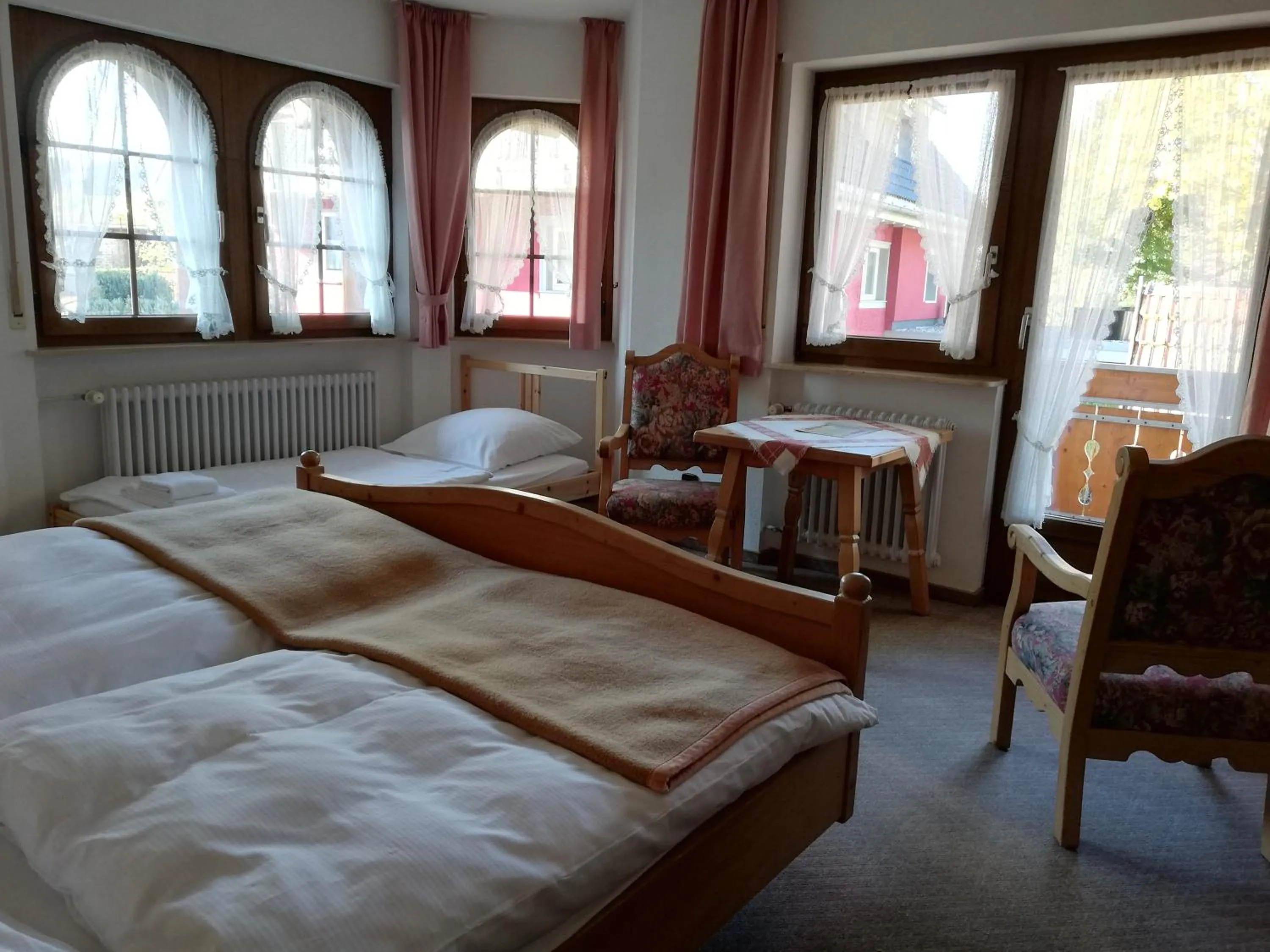 Photo of the whole room, Bed in Gästehaus Rössle