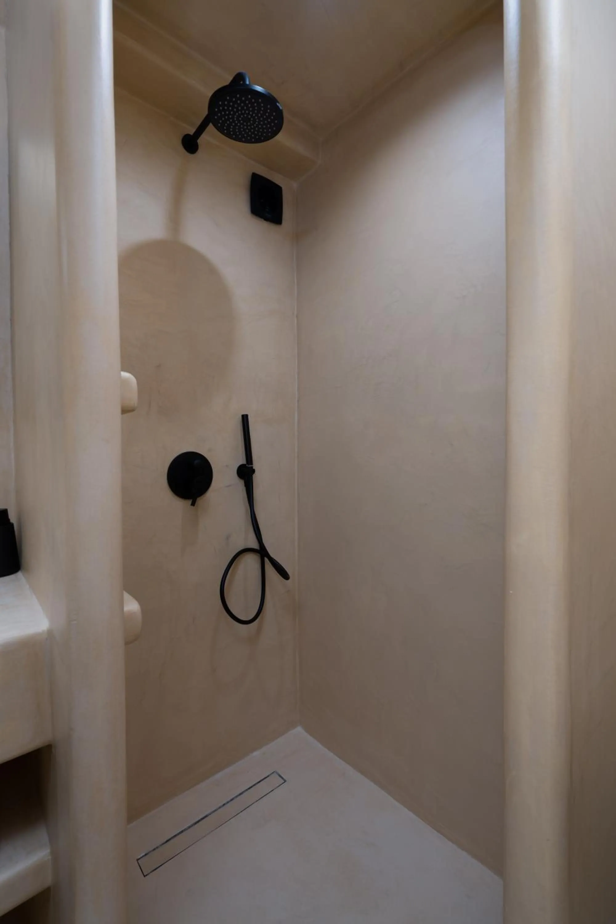 Shower in White Orchid Boutique Apartments