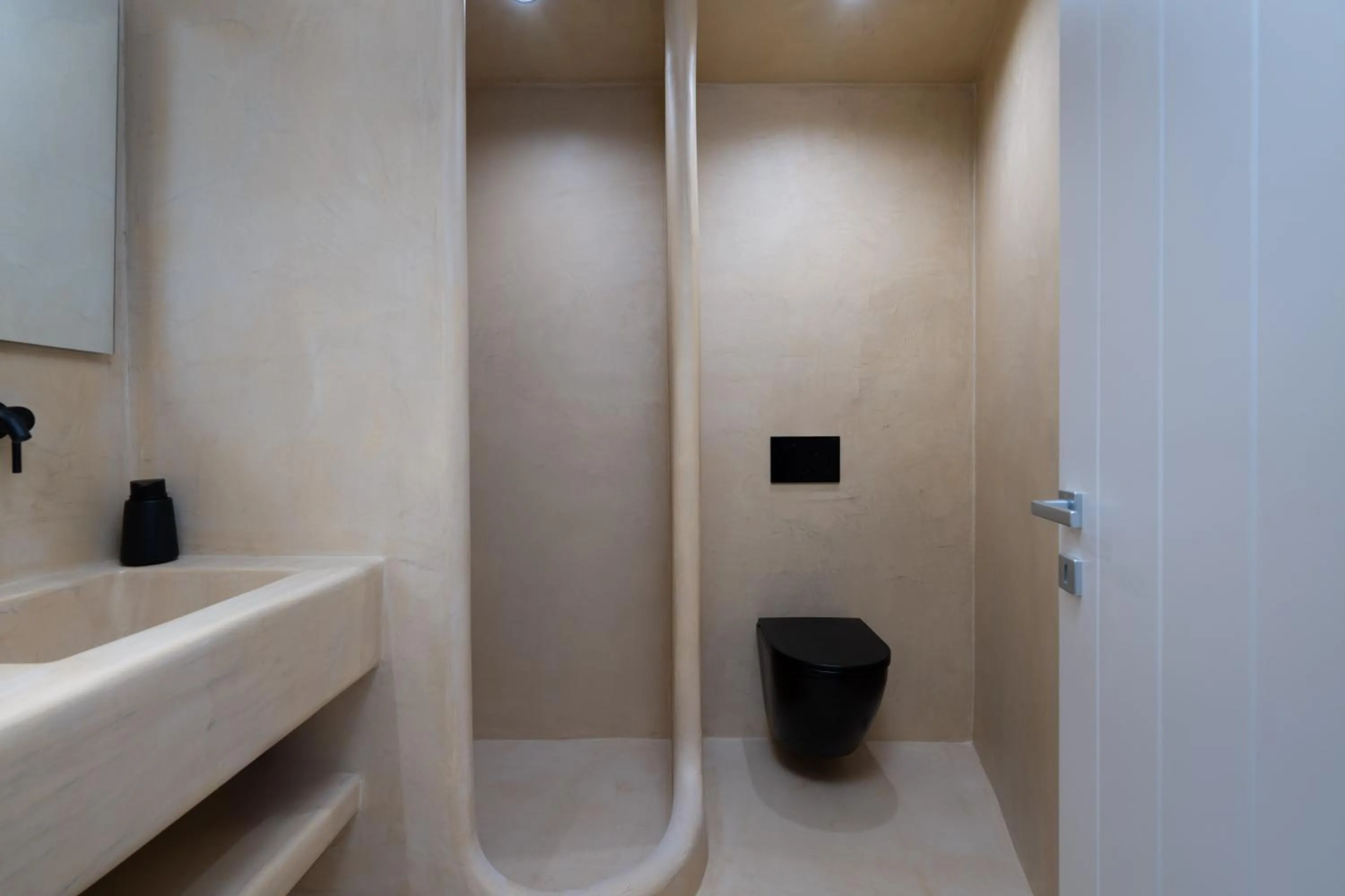 Shower in White Orchid Boutique Apartments