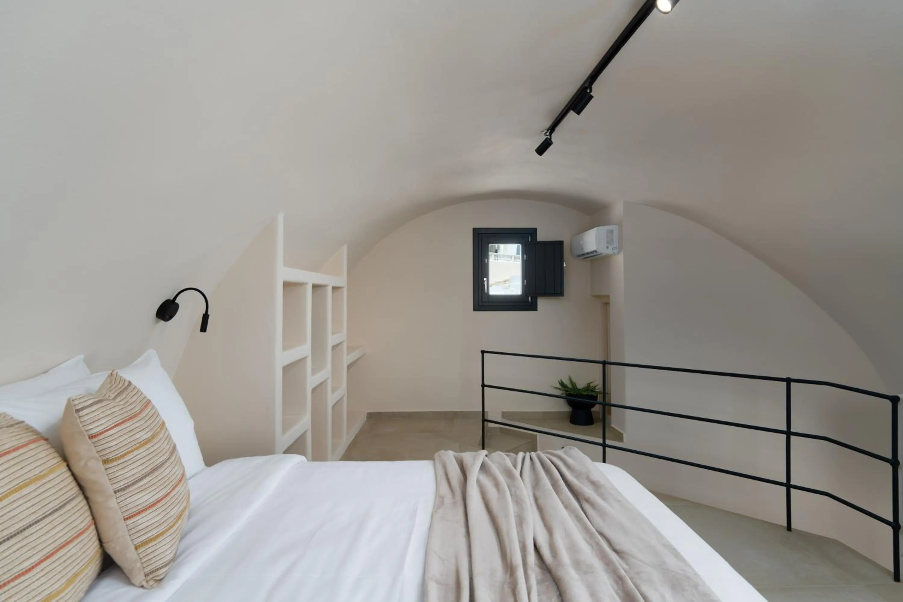 Bed in White Orchid Boutique Apartments