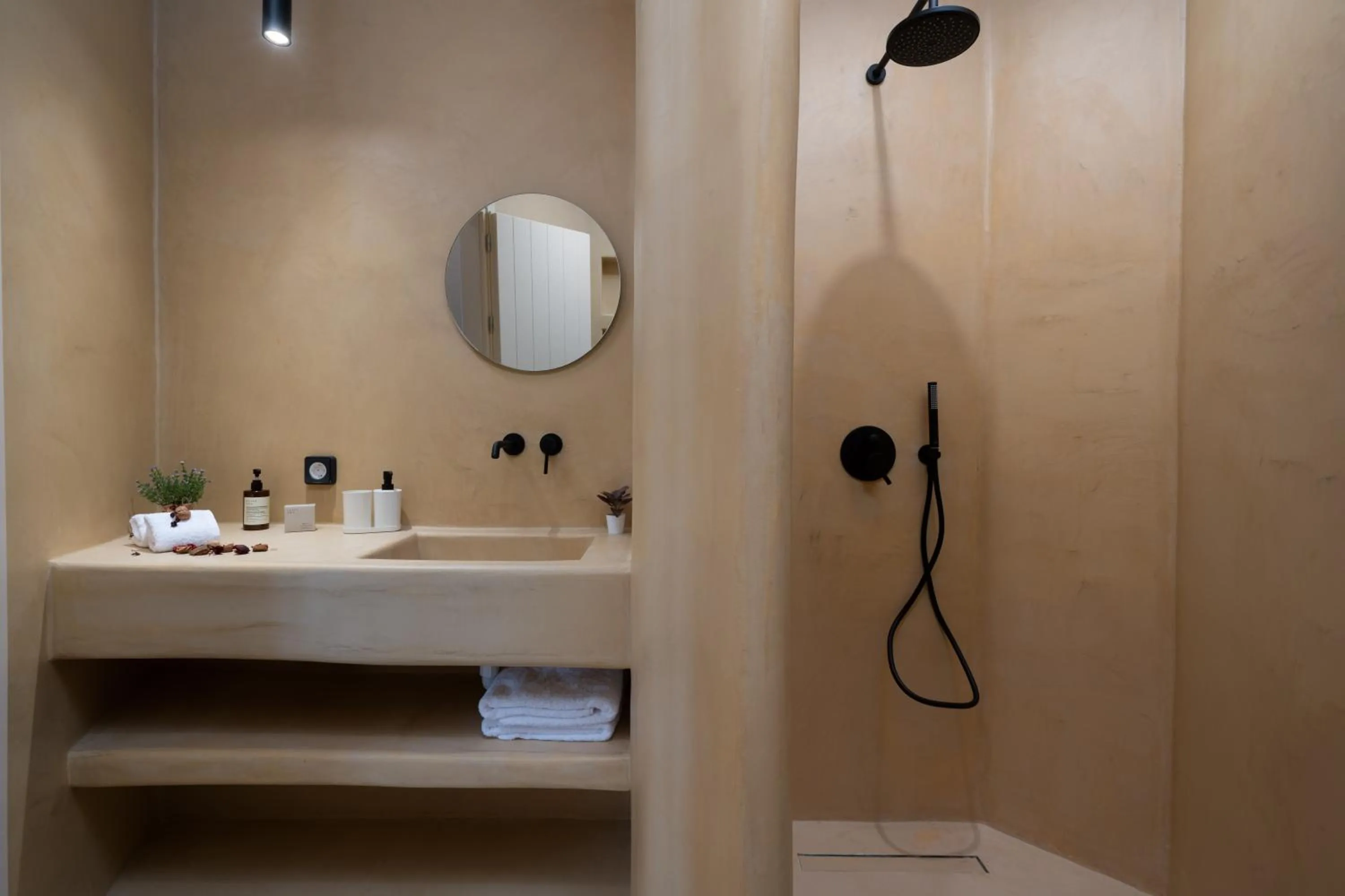 Shower in White Orchid Boutique Apartments