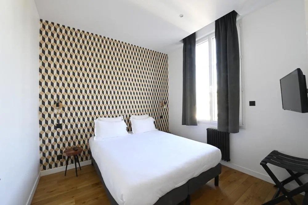 Bed in Manoir de l'évêché et Spa