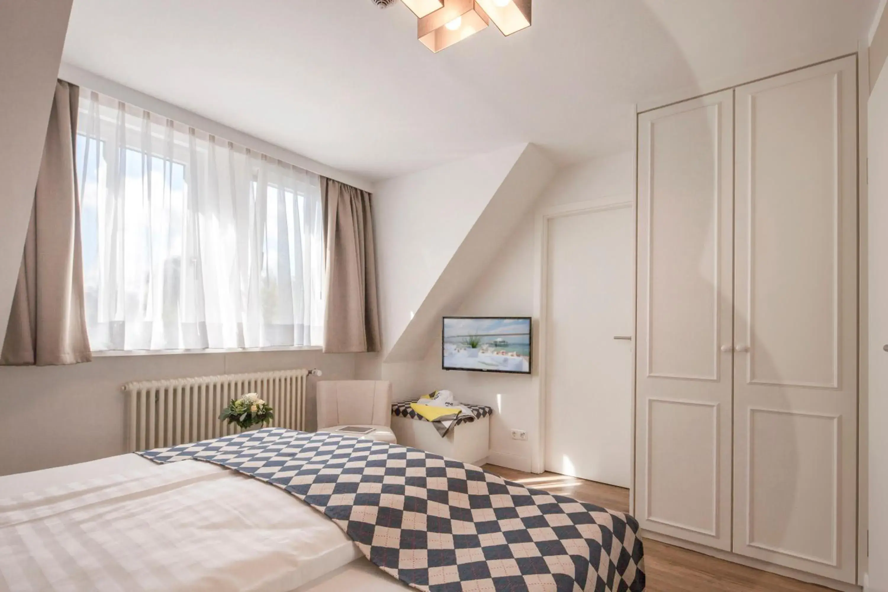 Photo of the whole room, Bed in Strandgrün Golf- & Spa Resort Photo of the whole room, Bed in Strandgrün Golf- & Spa Resort