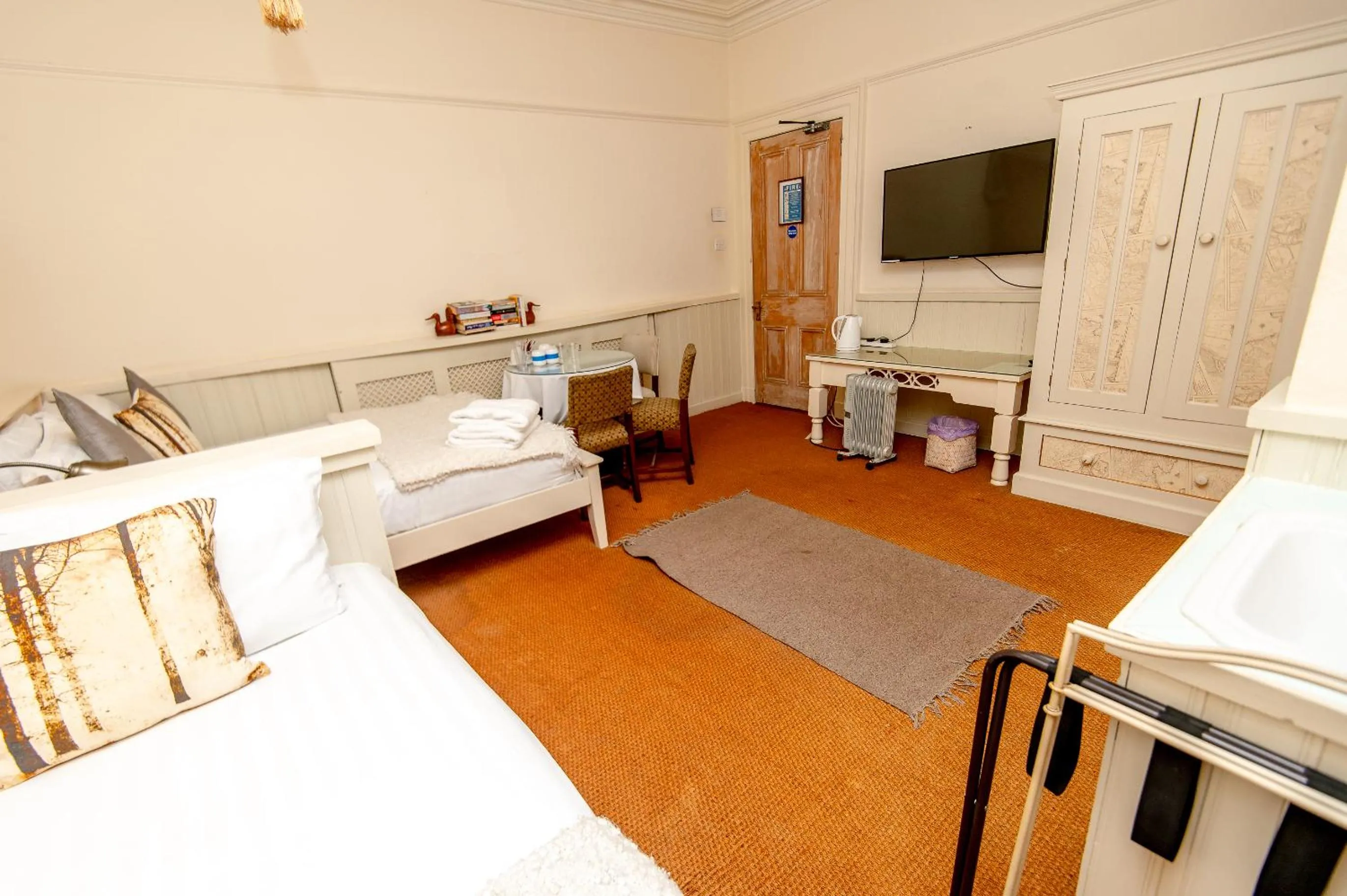 Bedroom, Bed in OYO Cornerstone Manor Hotel