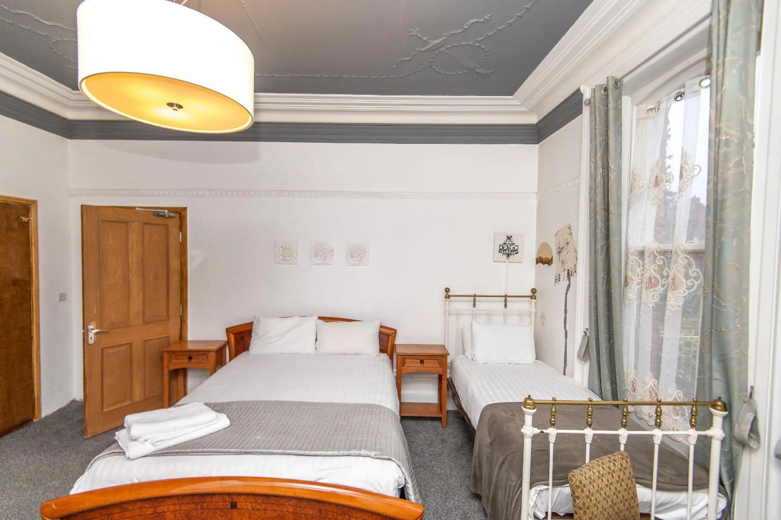 Bedroom, Bed in OYO Cornerstone Manor Hotel
