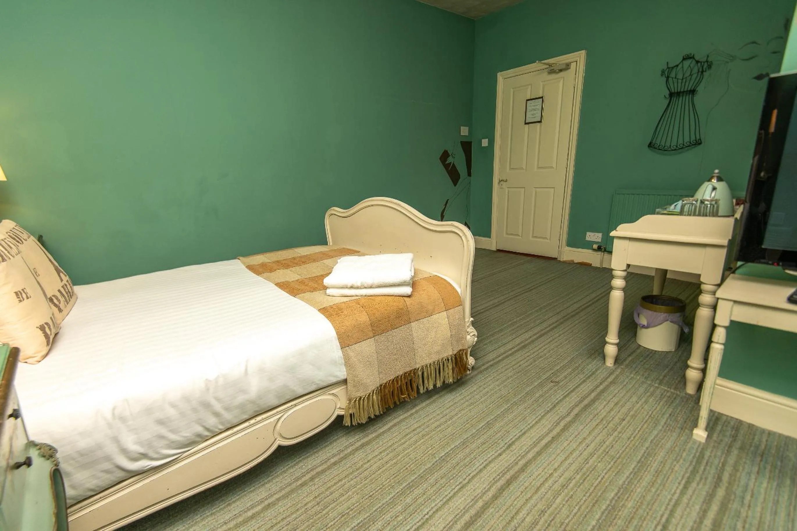 Bedroom, Bed in OYO Cornerstone Manor Hotel