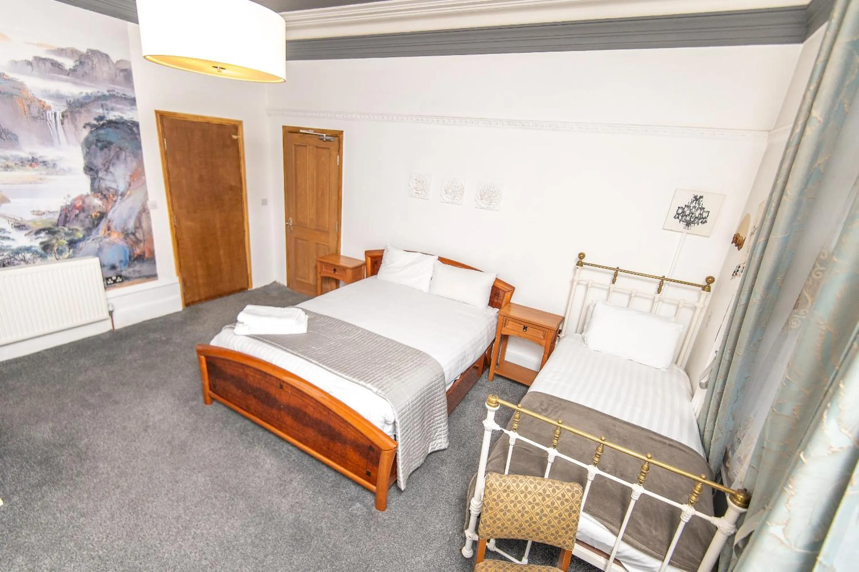 Bedroom, Bed in OYO Cornerstone Manor Hotel