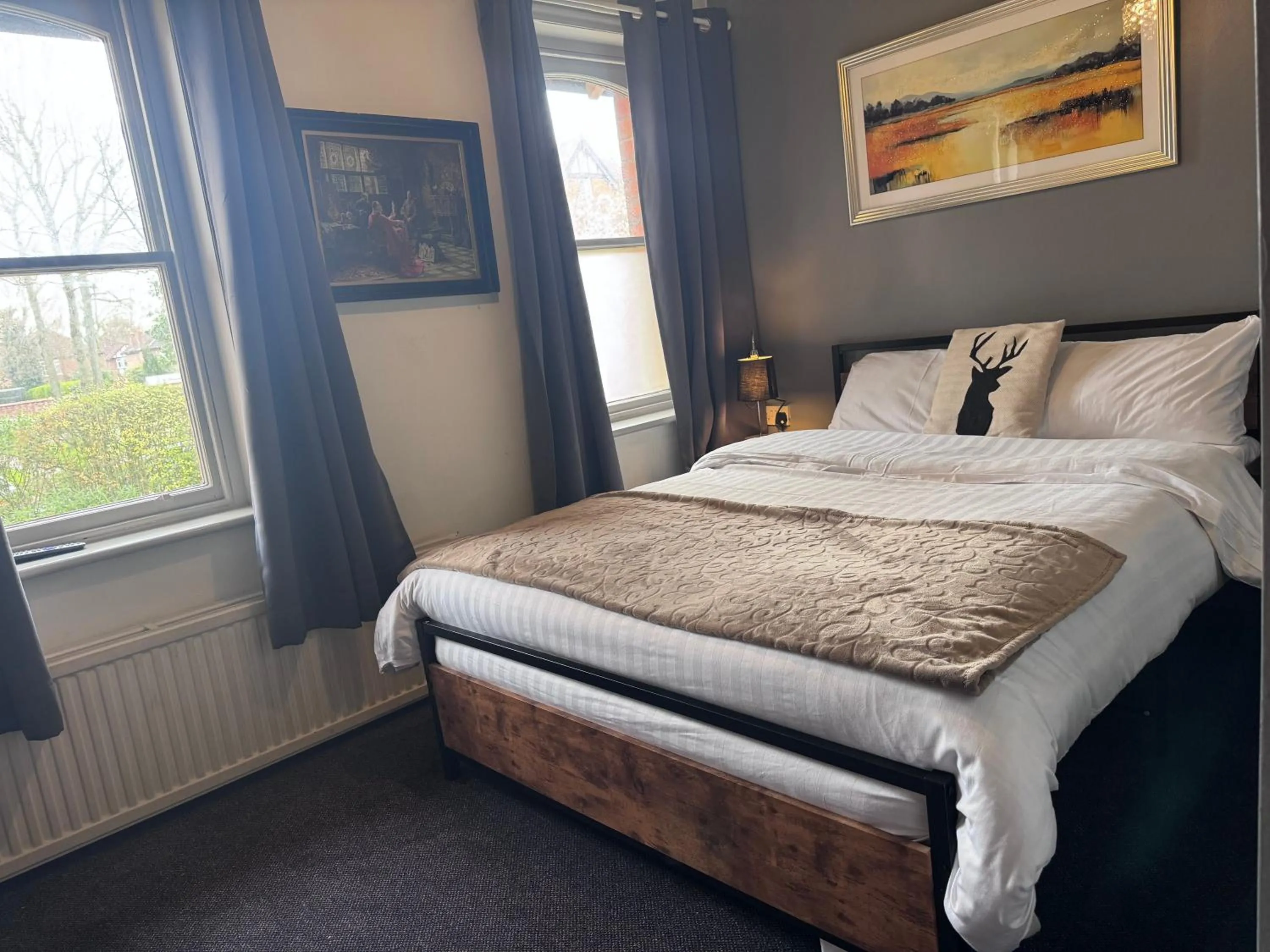 Bed in OYO Cornerstone Manor Hotel