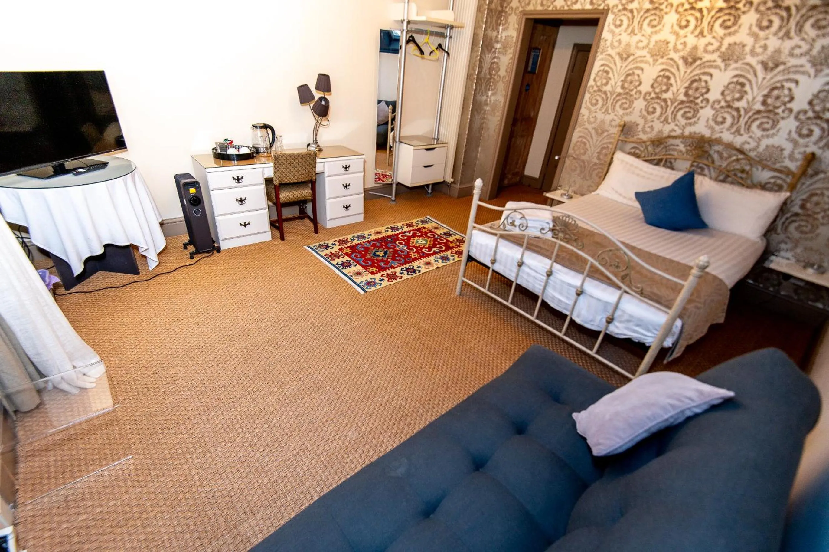 Bedroom, Bed in OYO Cornerstone Manor Hotel