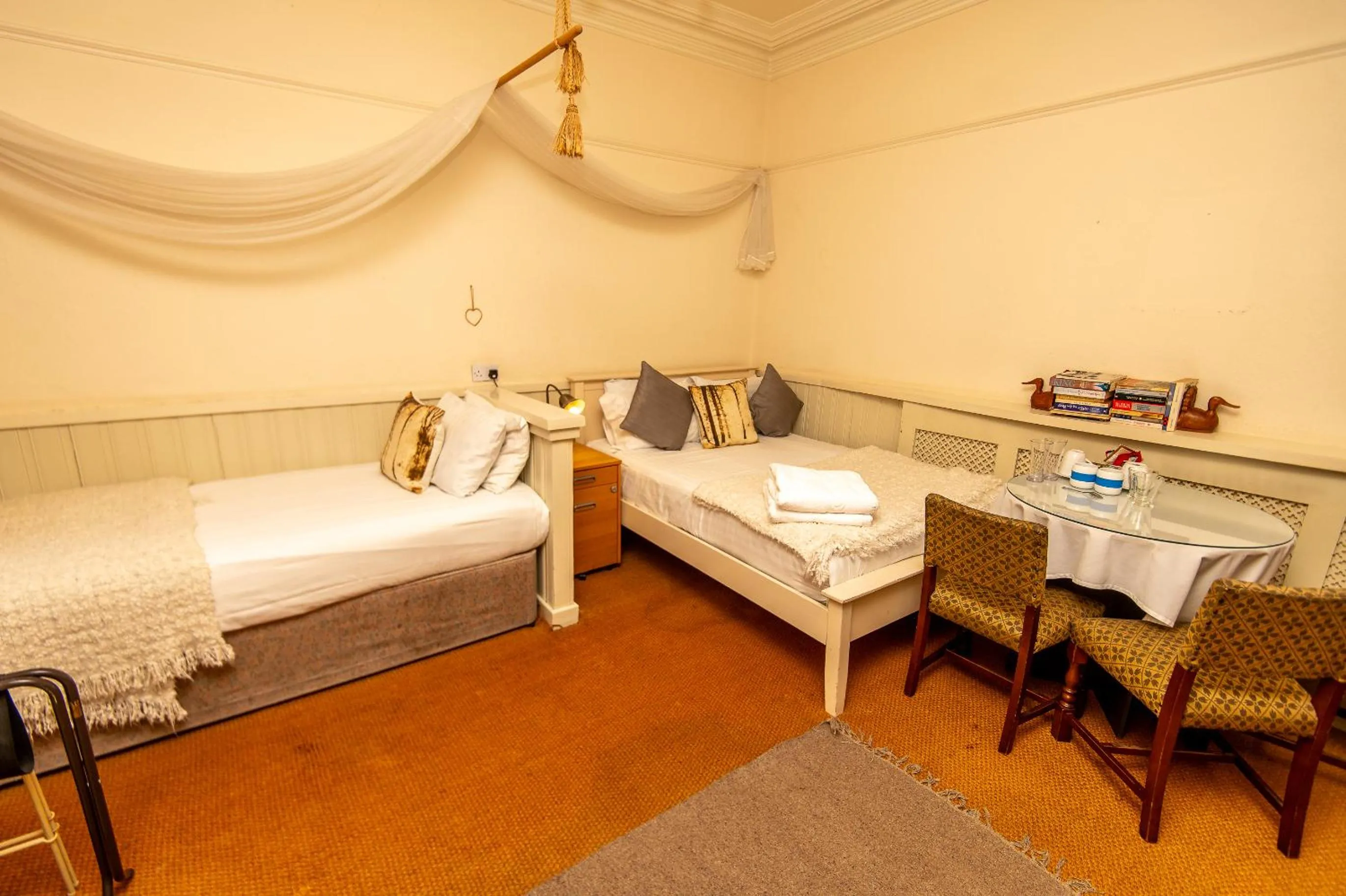 Bedroom, Bed in OYO Cornerstone Manor Hotel
