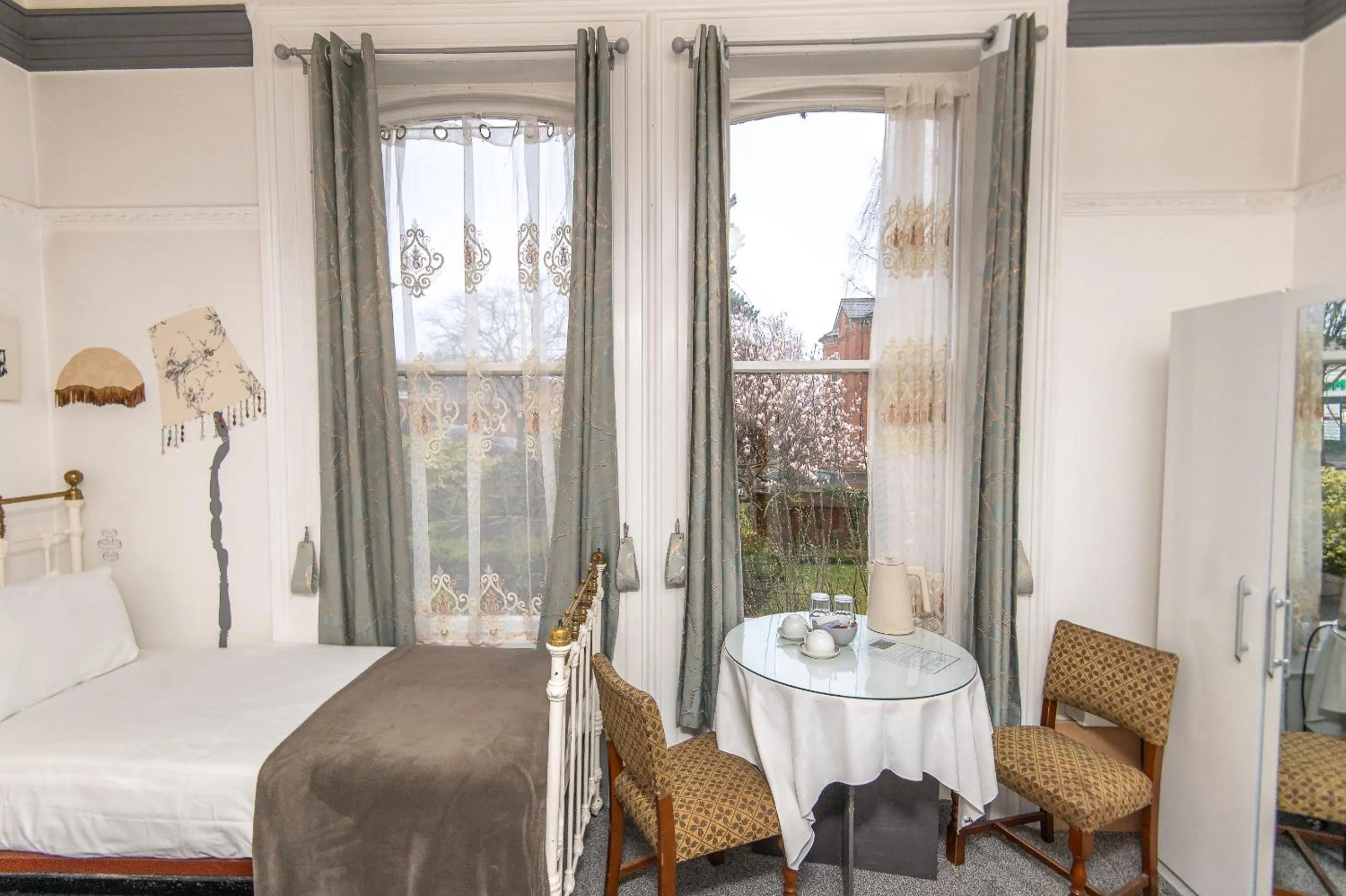 Bedroom, Bed in OYO Cornerstone Manor Hotel