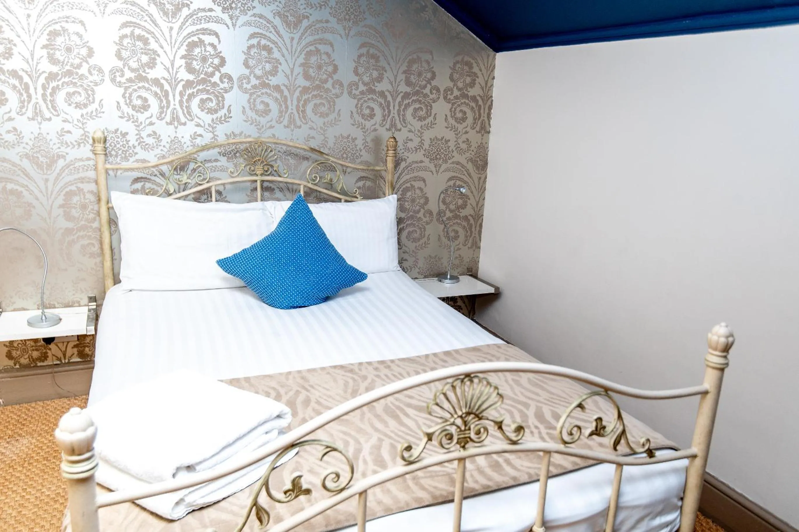 Bedroom, Bed in OYO Cornerstone Manor Hotel