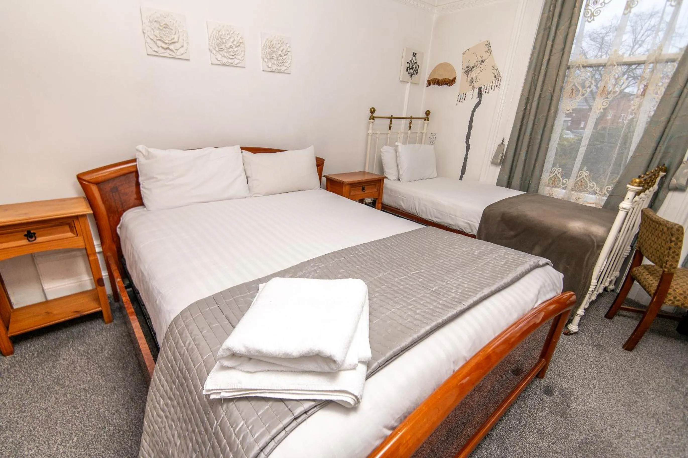 Bedroom, Bed in OYO Cornerstone Manor Hotel