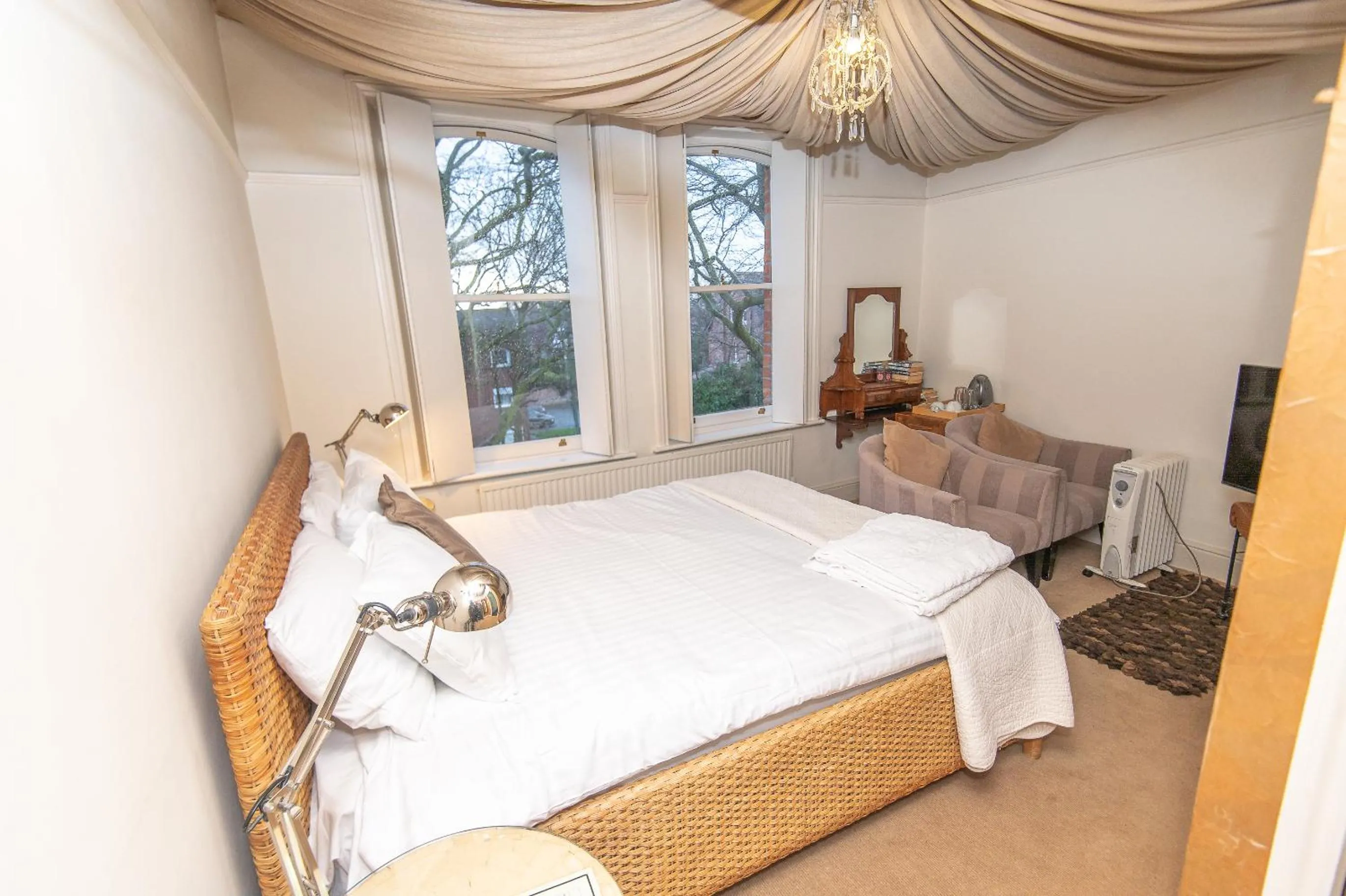 Bedroom, Bed in OYO Cornerstone Manor Hotel