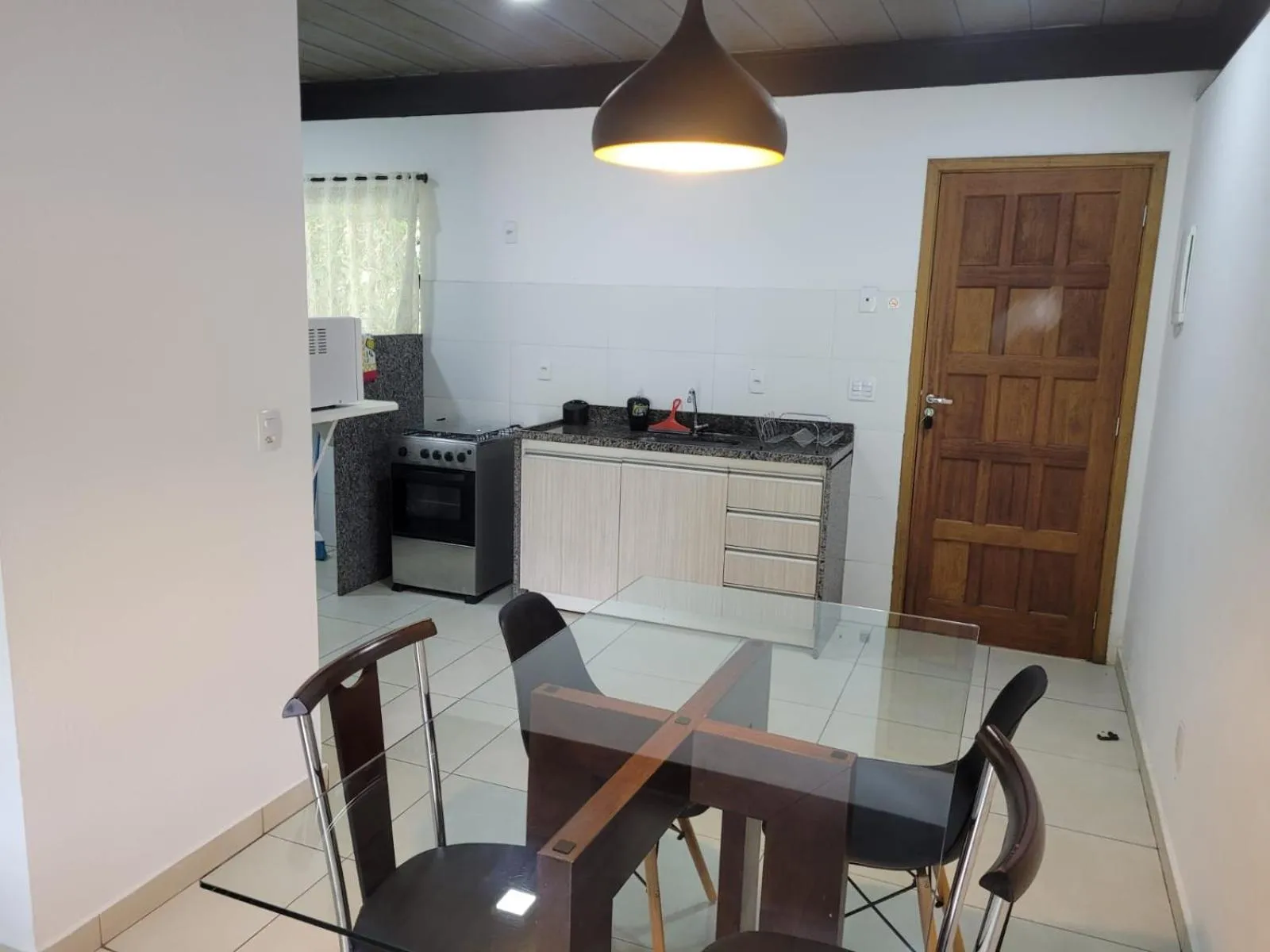 Communal kitchen in Aconchego Serra Imperial