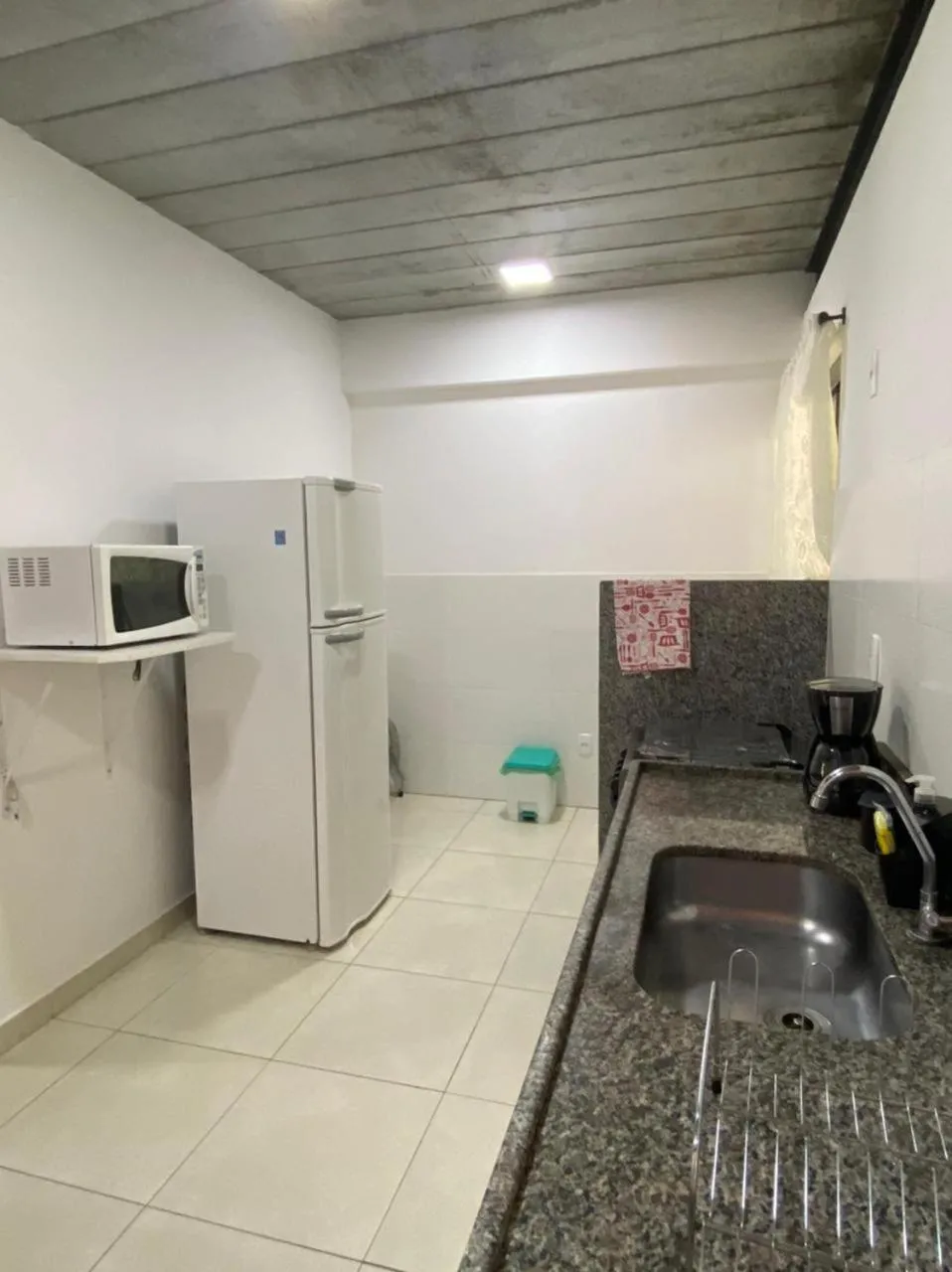 Communal kitchen in Aconchego Serra Imperial