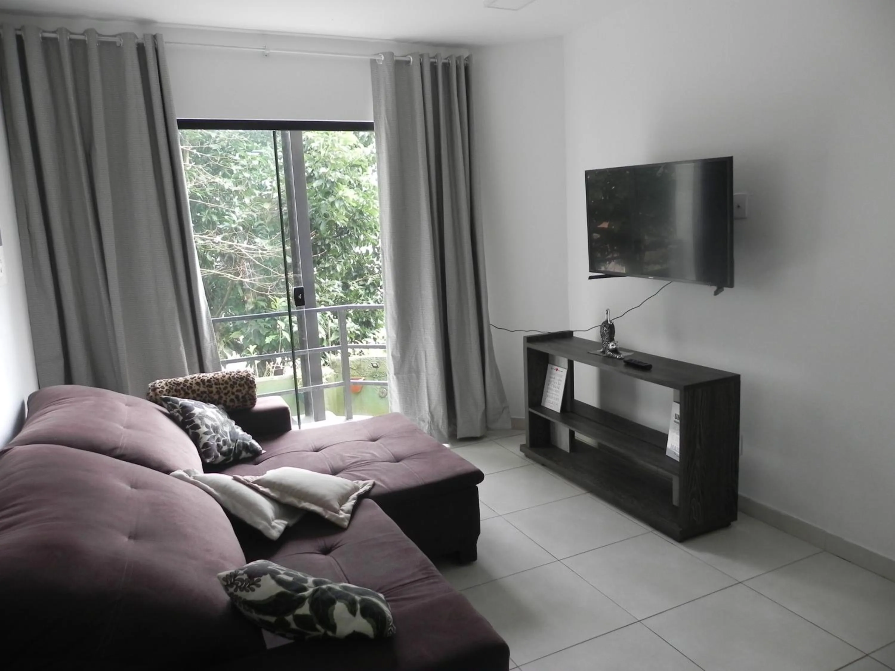 Living room in Aconchego Serra Imperial