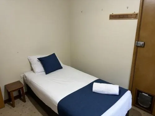 Bedroom, Bed in Bridge Motel Wellington