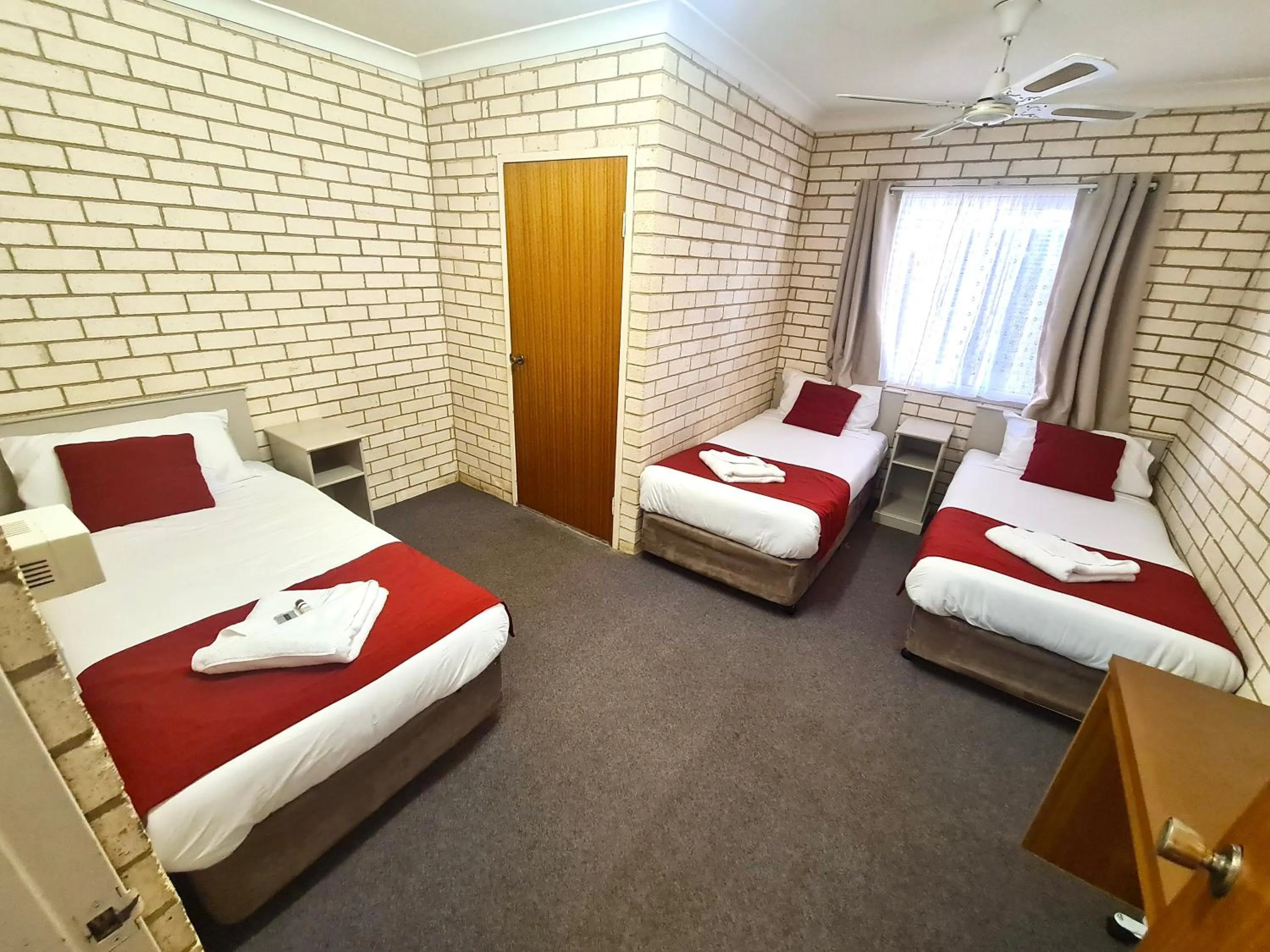 Family, Bed in Bridge Motel Wellington