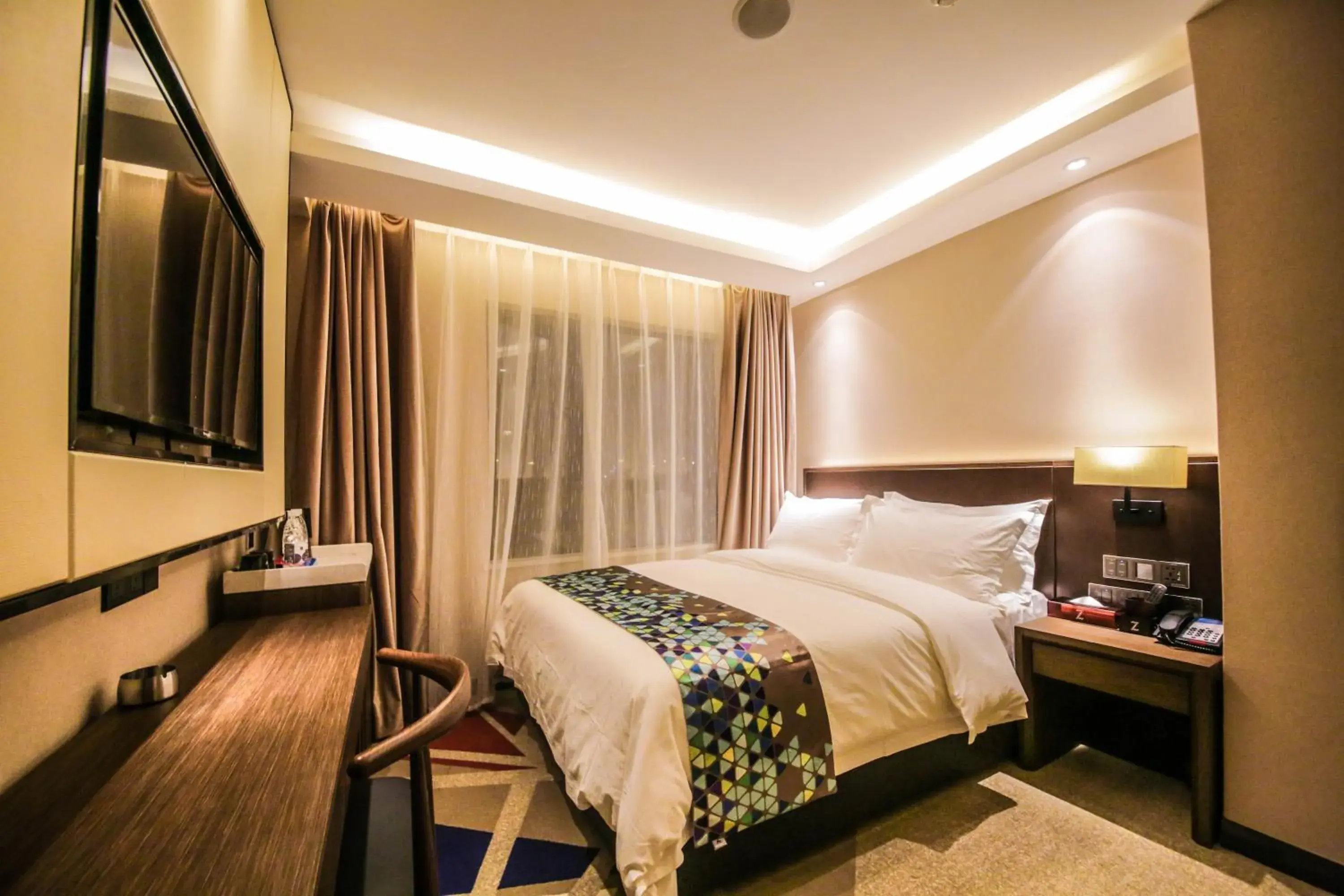 Bed in Chao Man Hotel(Guangzhou Pazhou Exhibition Center Chigang Subway Station) Bed in Chao Man Hotel(Guangzhou Pazhou Exhibition Center Chigang Subway Station)