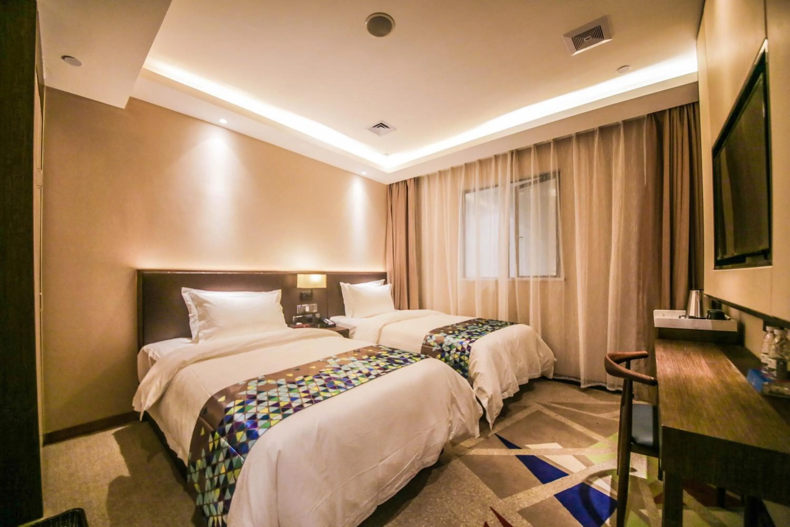 Bed in Chao Man Hotel(Guangzhou Pazhou Exhibition Center Chigang Subway Station)