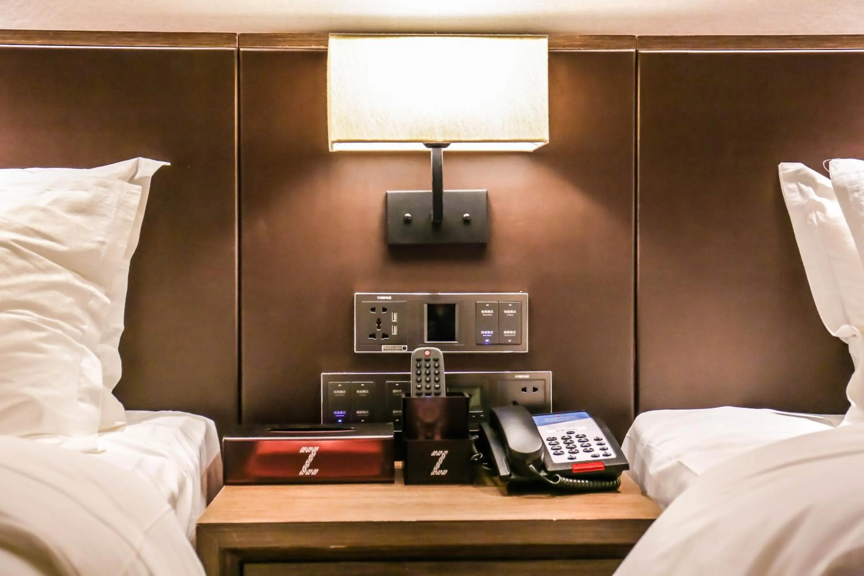 Bed in Chao Man Hotel(Guangzhou Pazhou Exhibition Center Chigang Subway Station)