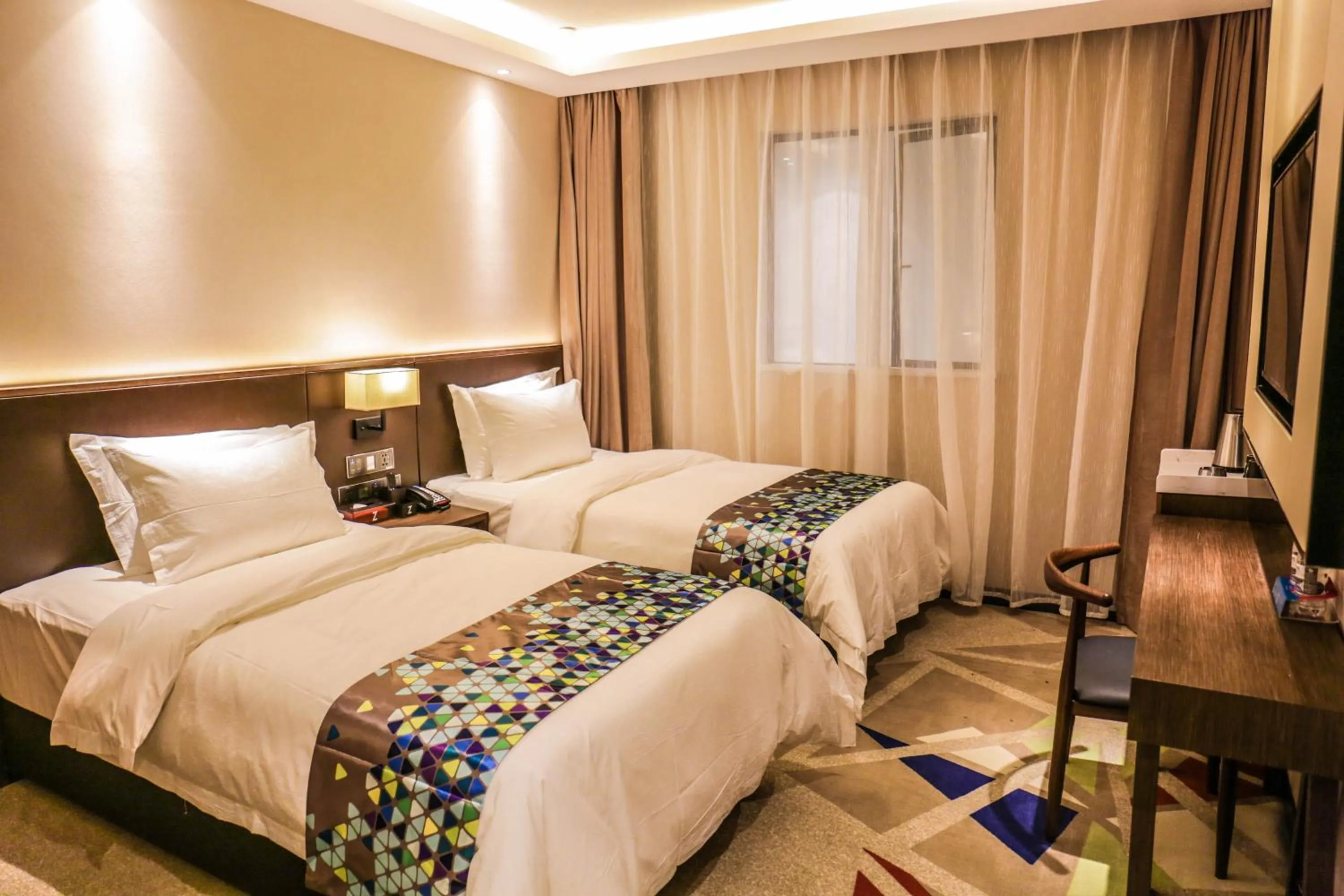 Bed in Chao Man Hotel(Guangzhou Pazhou Exhibition Center Chigang Subway Station)