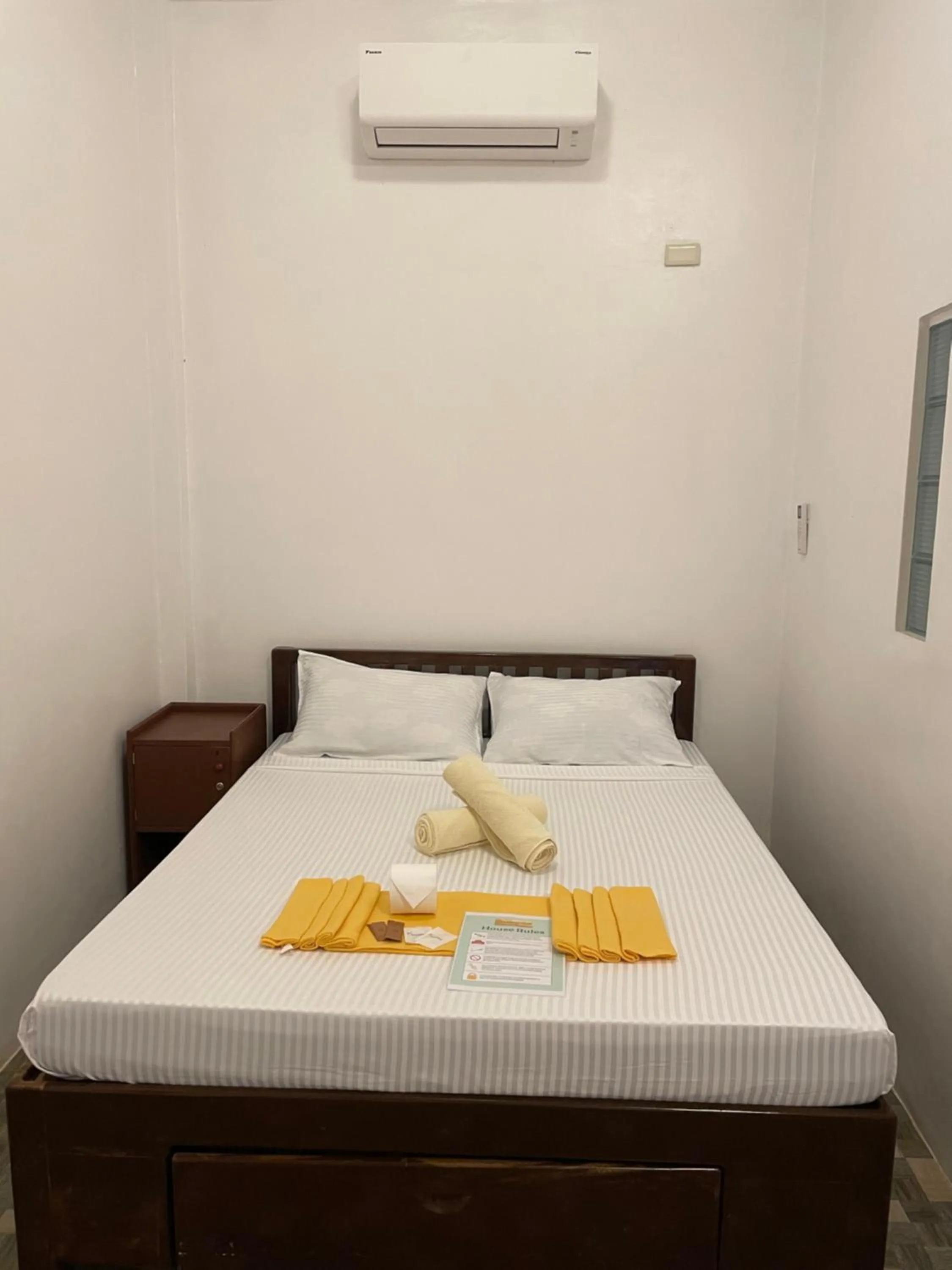 Bed in Oceanfront Beach Resort